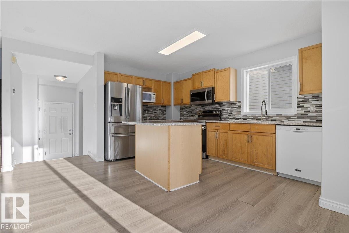 3323 26 Avenue, Edmonton, AB - Indoor Photo Showing Kitchen With Stainless Steel Kitchen