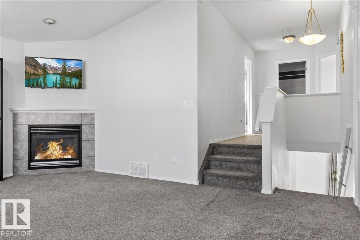 3323 26 Avenue, Edmonton, AB - Indoor With Fireplace