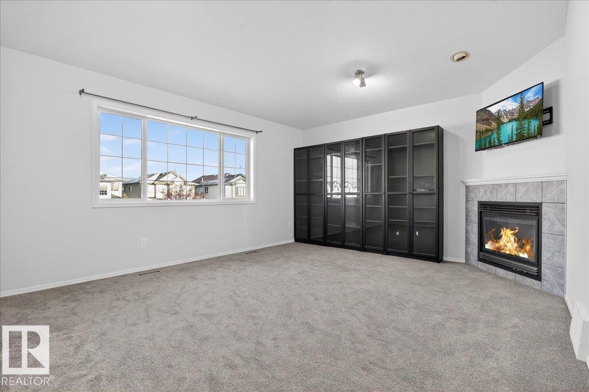 3323 26 Avenue, Edmonton, AB - Indoor With Fireplace