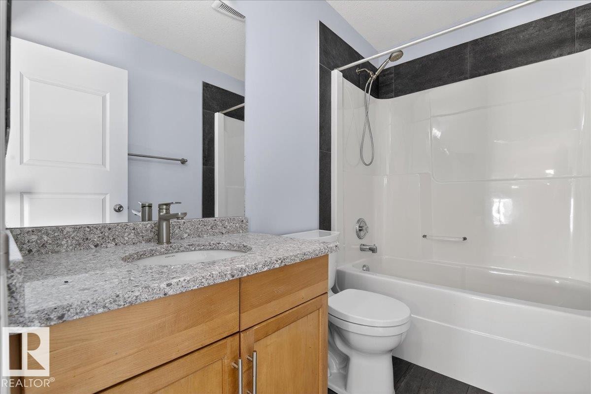 3323 26 Avenue, Edmonton, AB - Indoor Photo Showing Bathroom