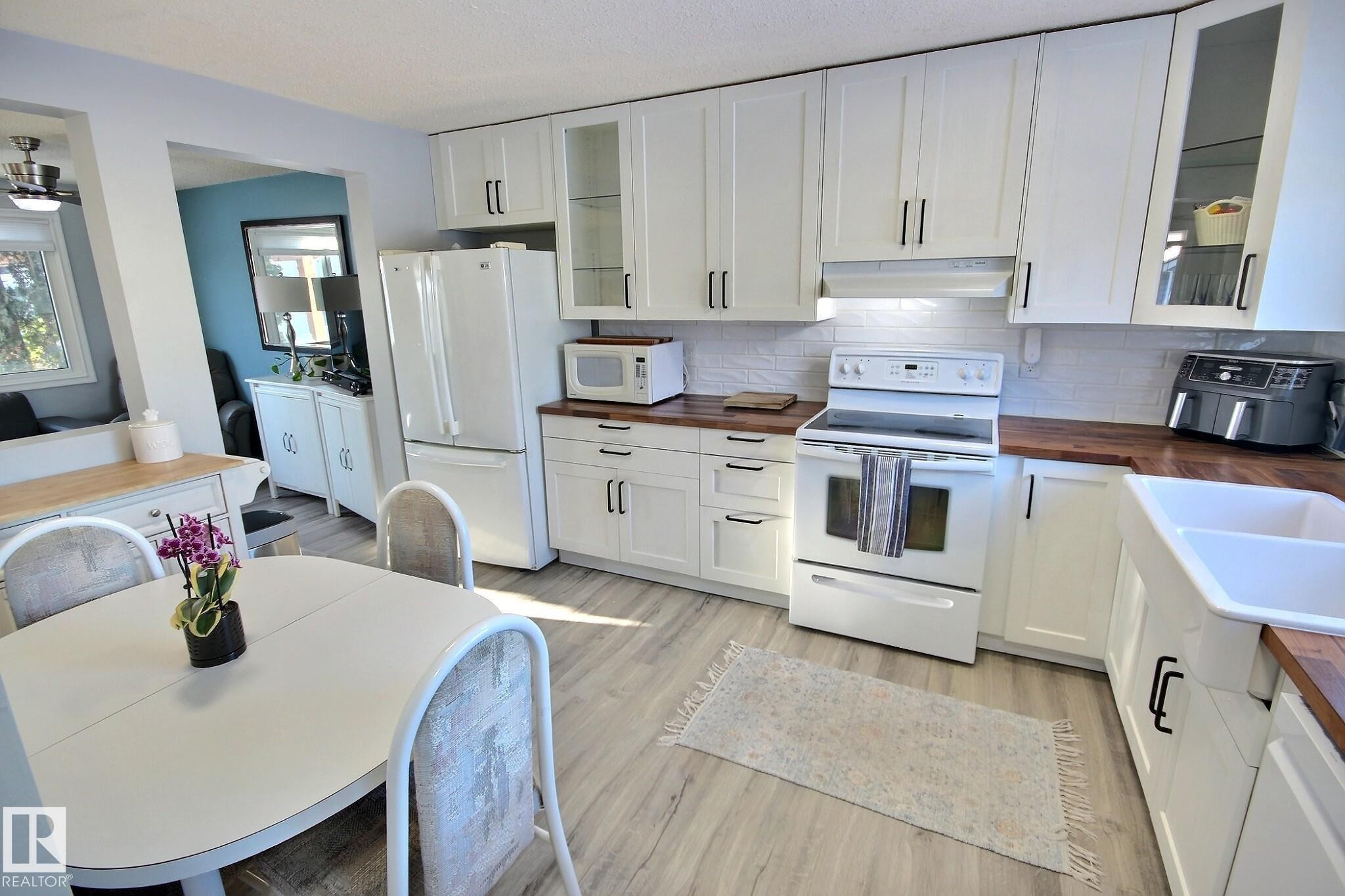 3519 16A Avenue, Edmonton, AB - Indoor Photo Showing Kitchen With Double Sink