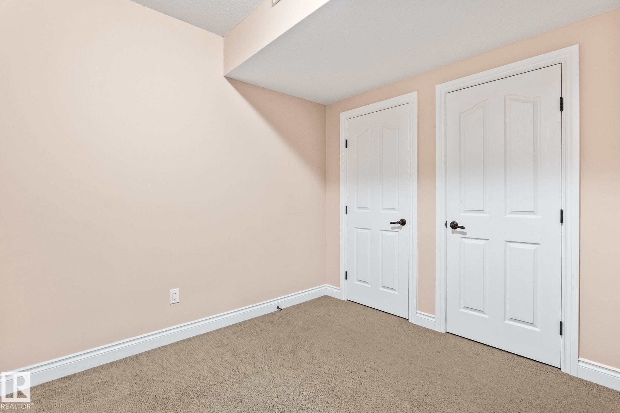 Unfurnished bedroom with carpet and baseboards - 1888 33 Street, Edmonton, AB - Indoor Photo Showing Other Room
