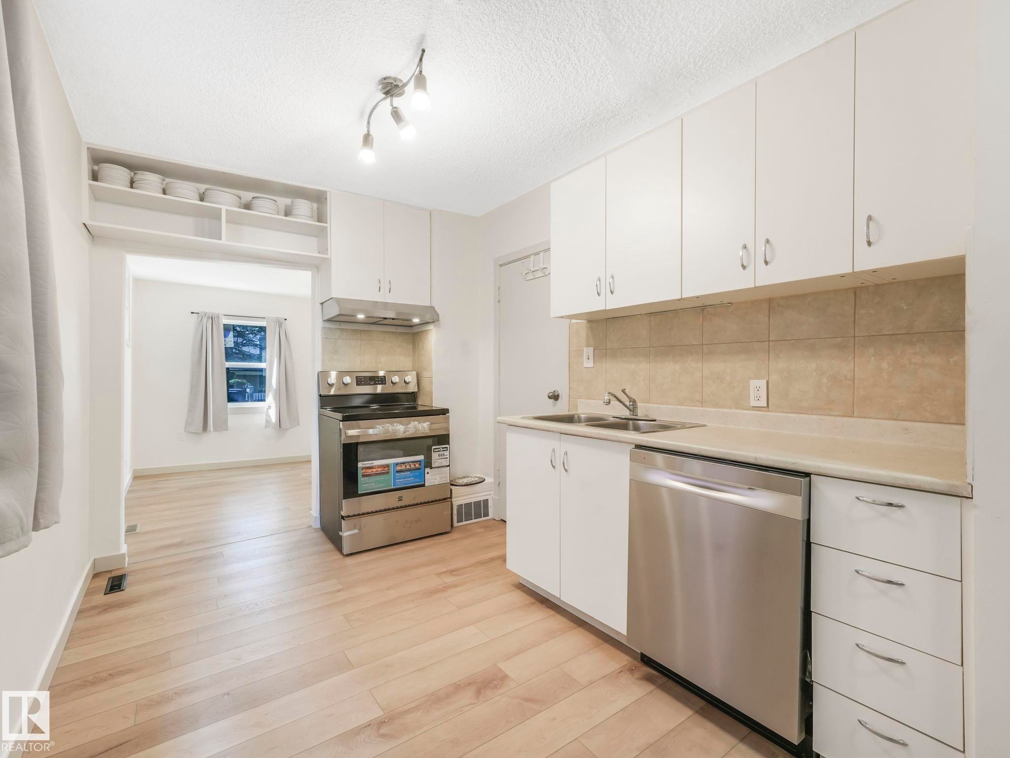 Edmonton, AB - Indoor Photo Showing Kitchen With Double Sink