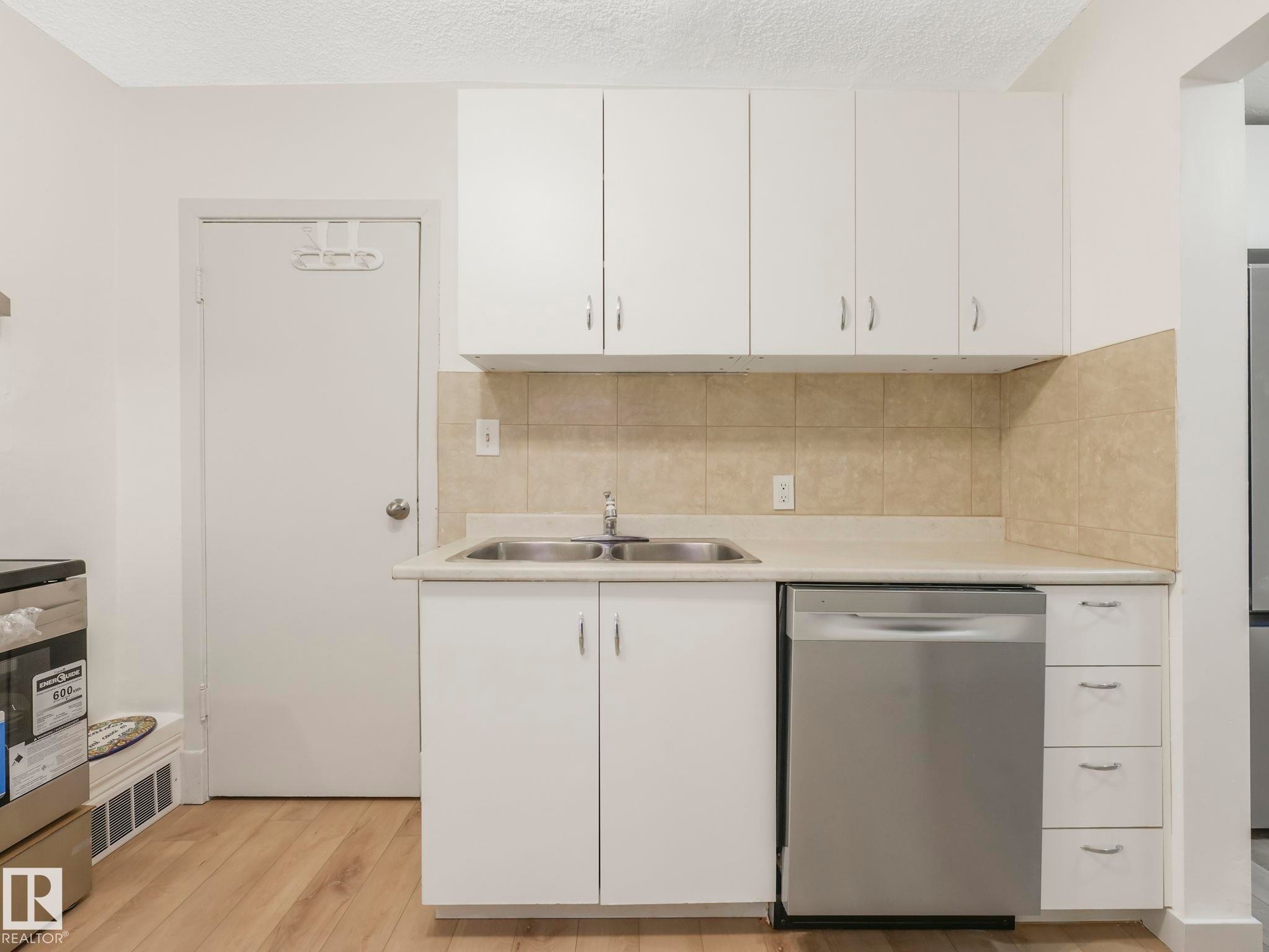 Edmonton, AB - Indoor Photo Showing Kitchen With Double Sink