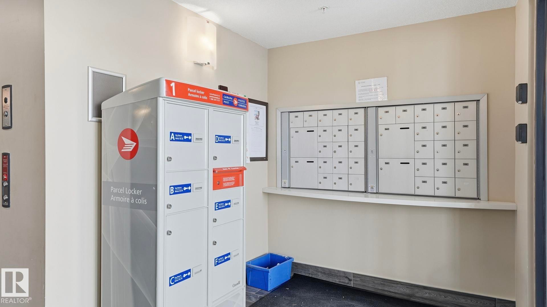 Surrounding community with mail area - 401 17 Columbia Avenue W, Devon, AB - Indoor Photo Showing Other Room