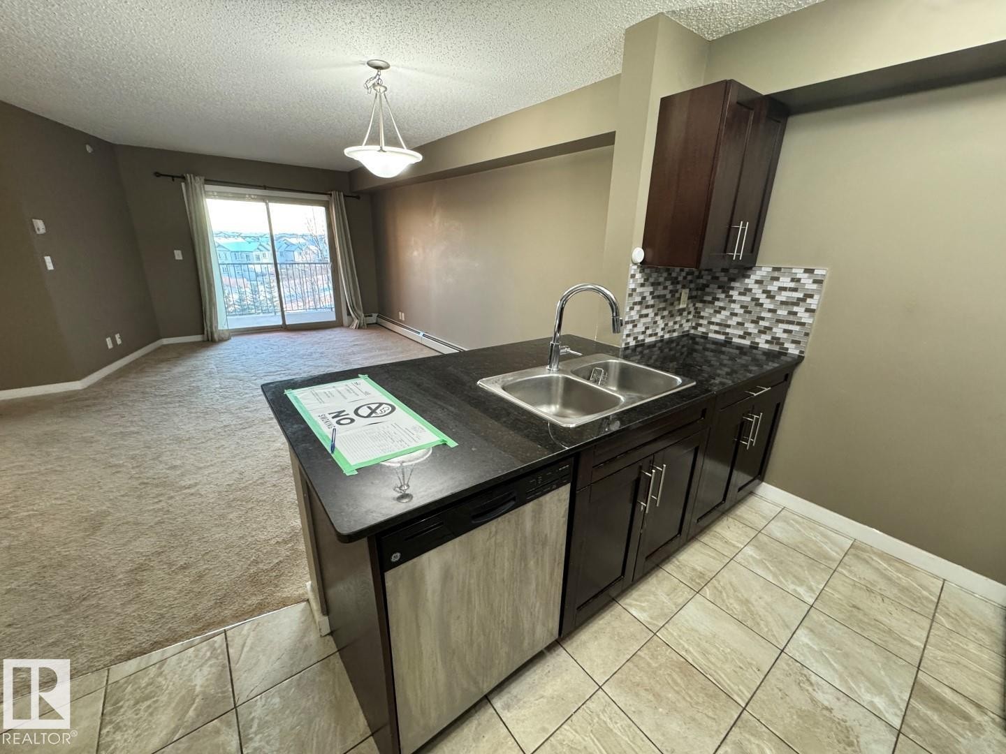 421 107 Watt Common, Edmonton, AB - Indoor Photo Showing Kitchen With Double Sink