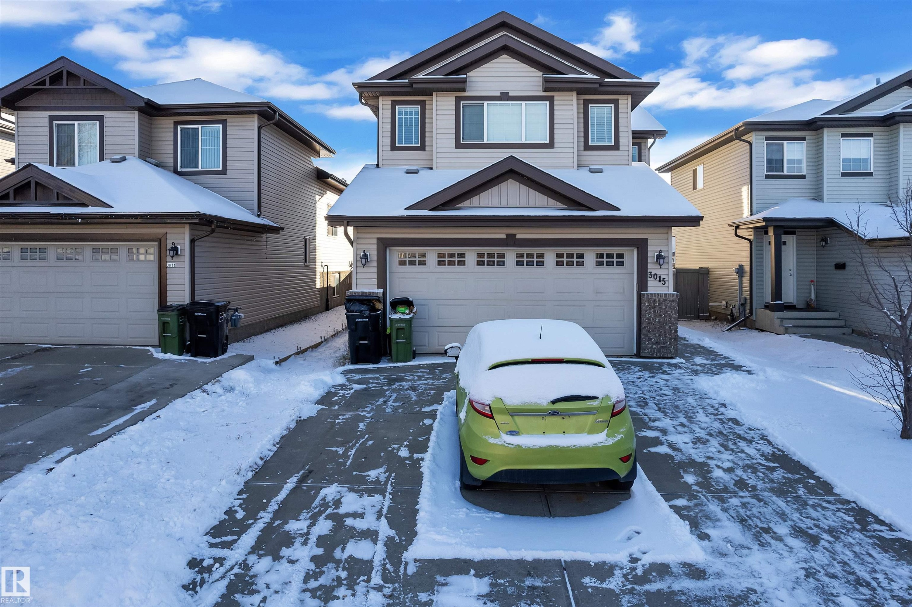 Craftsman inspired home with concrete driveway and an attached garage - 3015 26 Ave Nw, Edmonton, AB - Outdoor With Facade