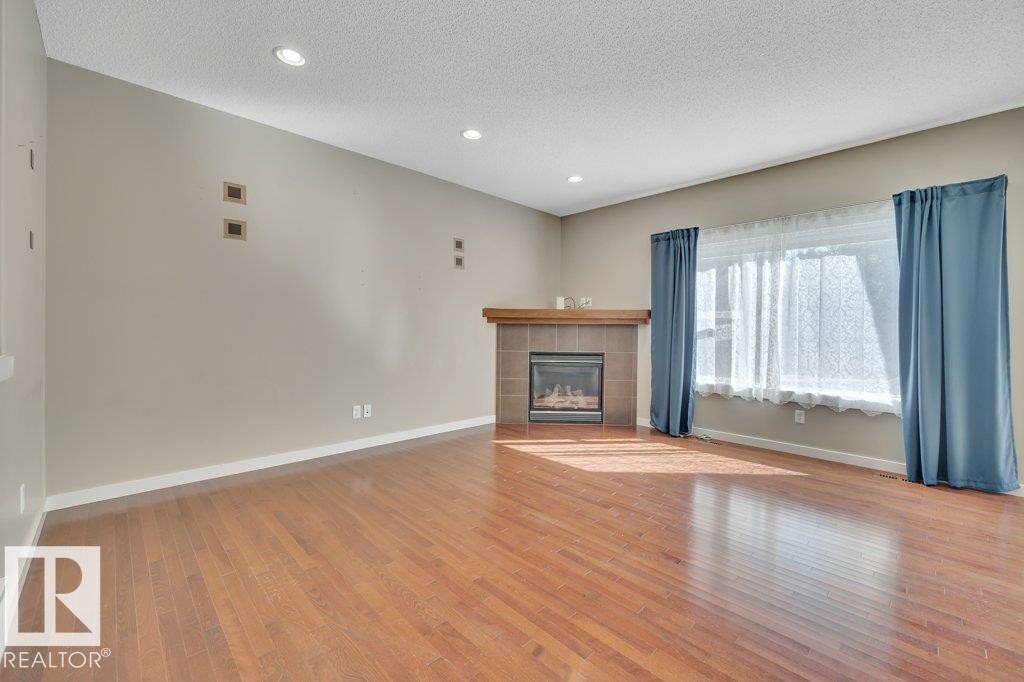 3054 Spence Wynd, Edmonton, AB - Indoor With Fireplace