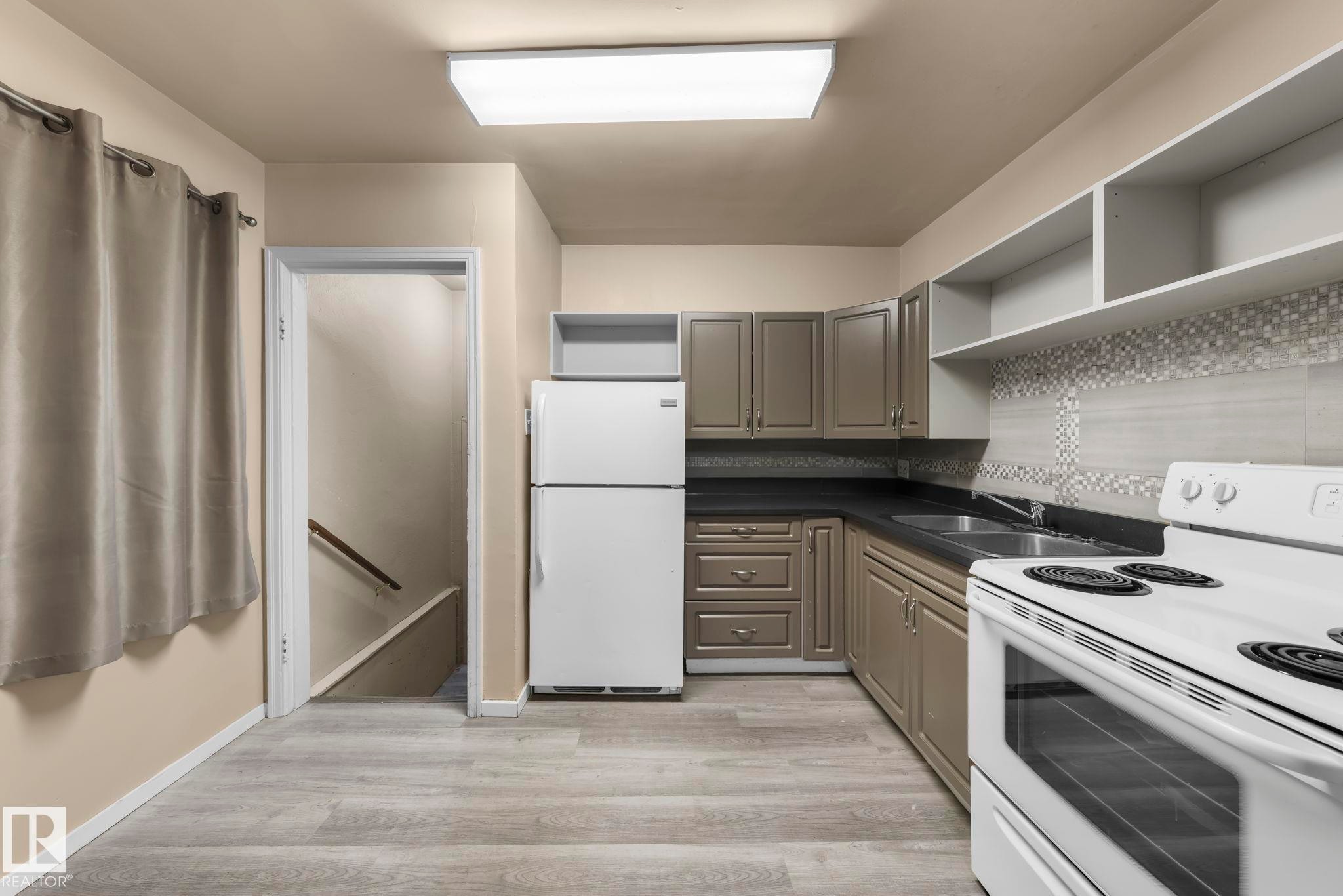 Edmonton, AB - Indoor Photo Showing Kitchen With Double Sink