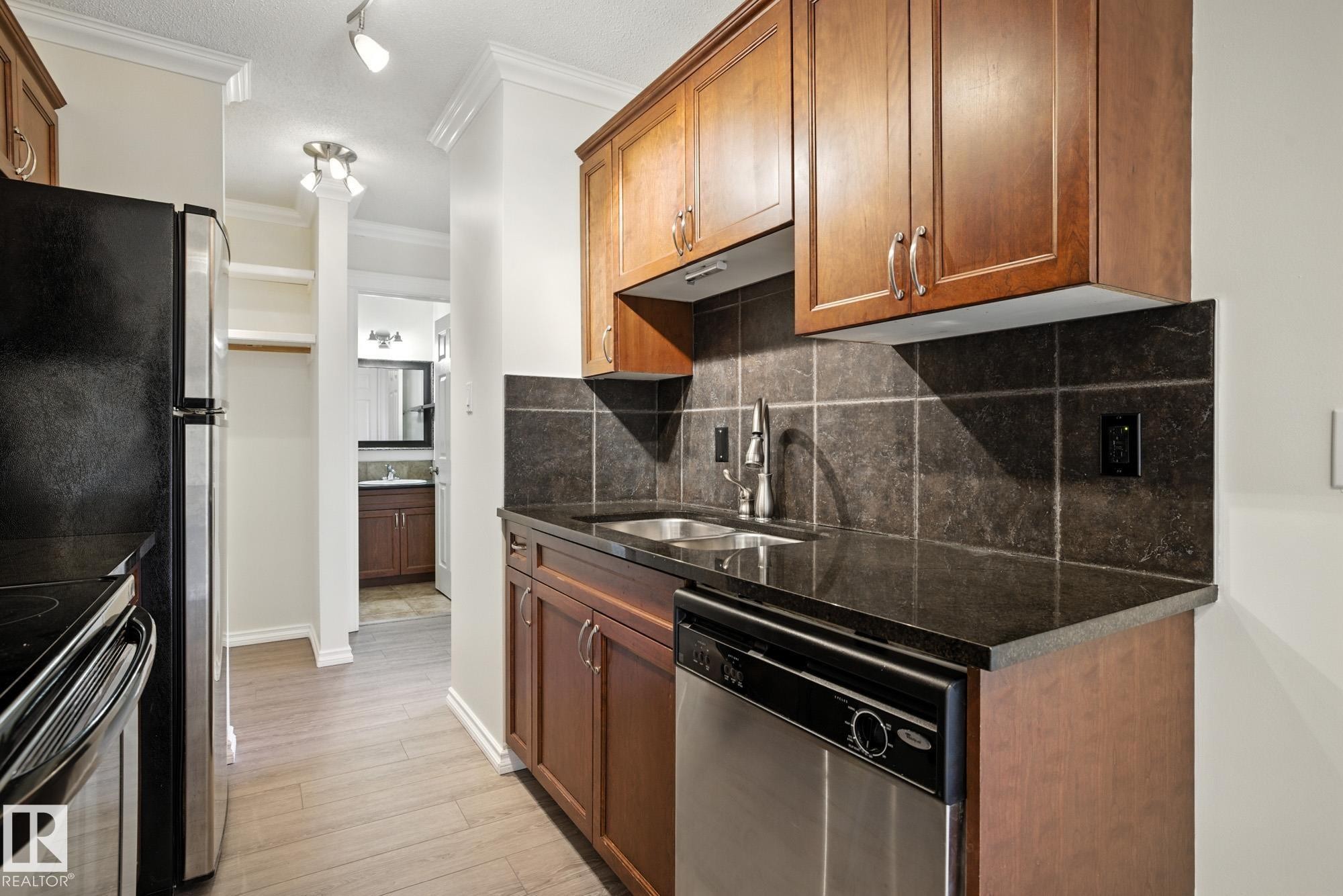 306 10160 83 Avenue, Edmonton, AB - Indoor Photo Showing Kitchen With Double Sink