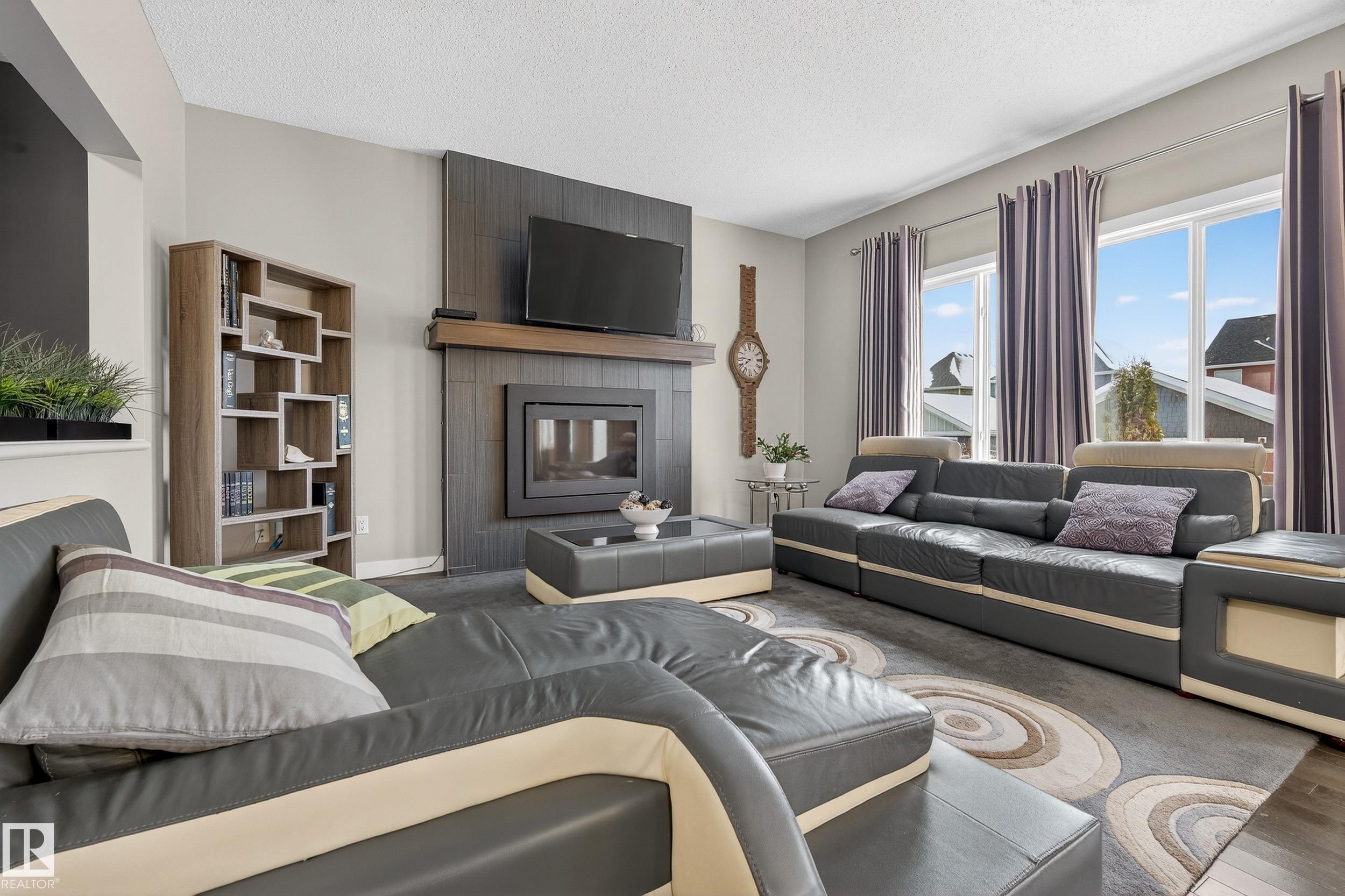 7816 18 Avenue, Edmonton, AB - Indoor Photo Showing Living Room With Fireplace