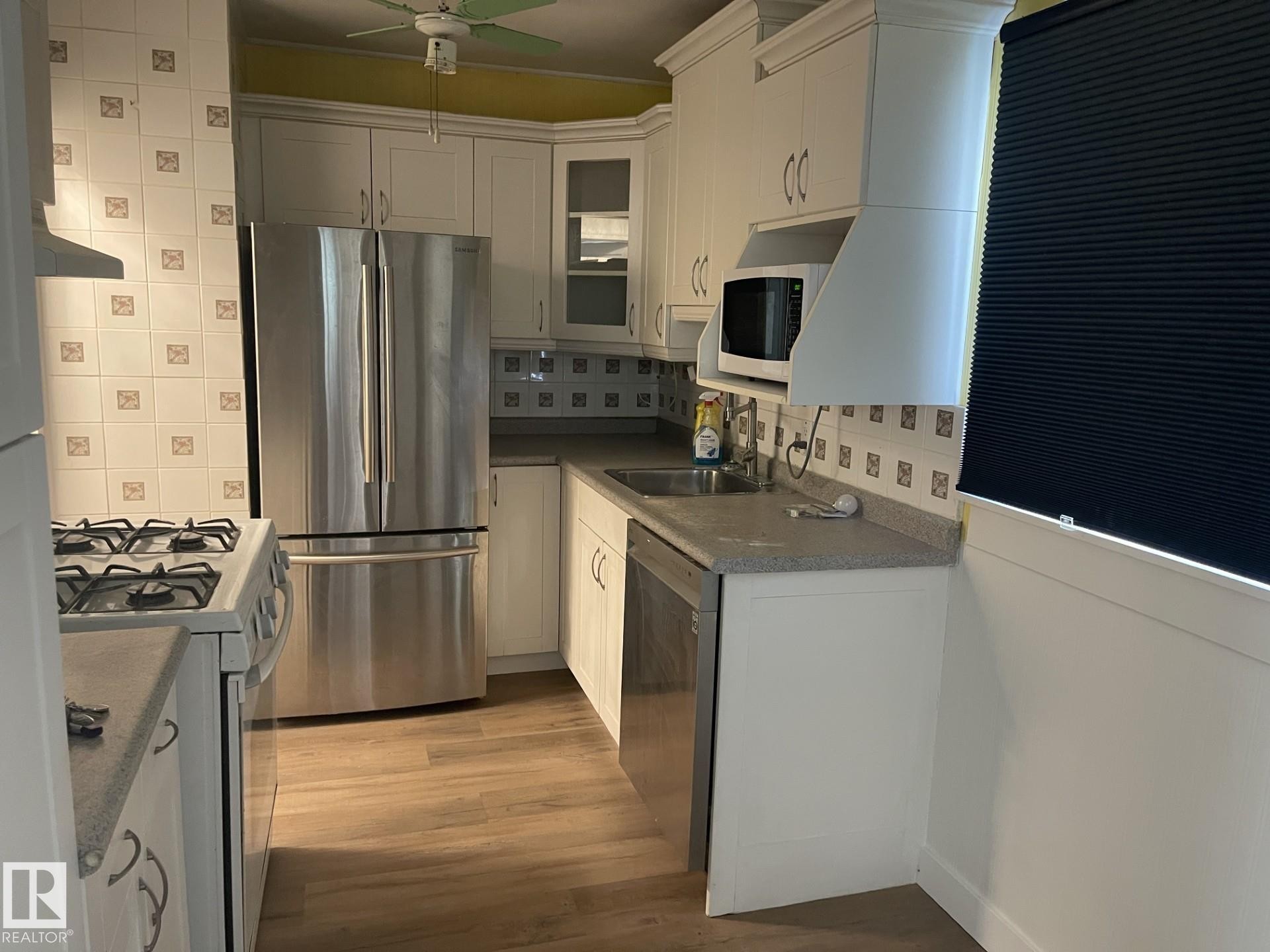 12202 105 Street, Edmonton, AB - Indoor Photo Showing Kitchen With Stainless Steel Kitchen