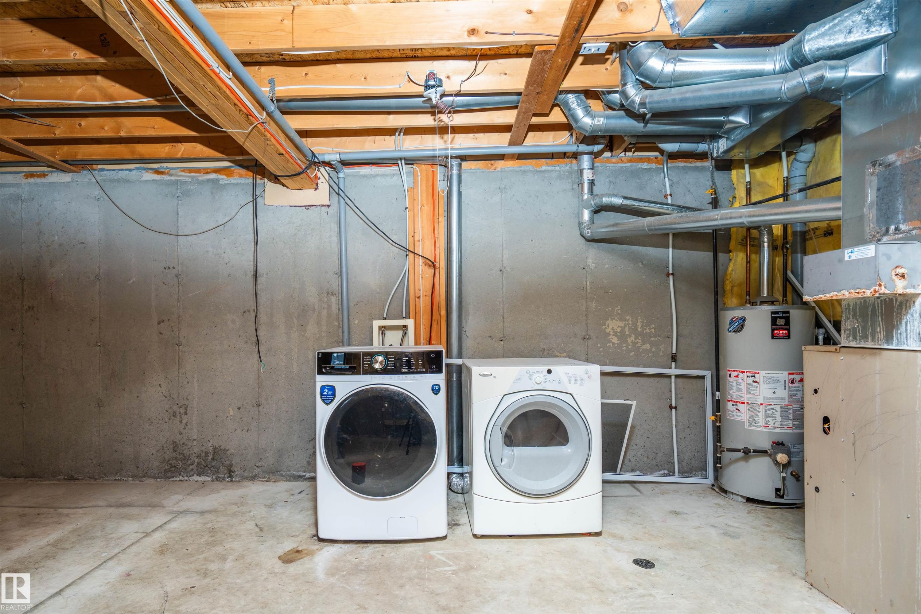 111 230 Edwards Drive, Edmonton, AB - Indoor Photo Showing Laundry Room