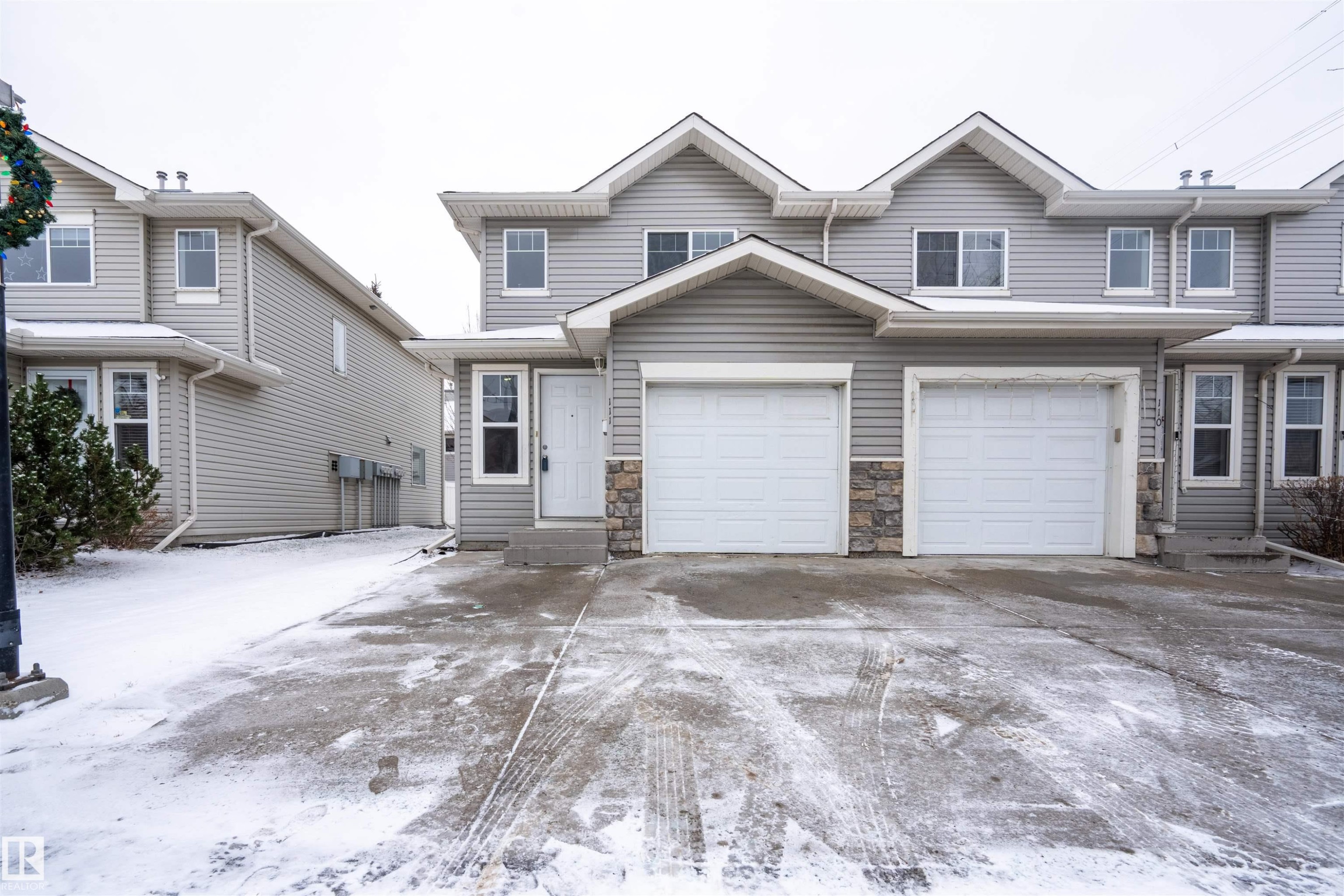 111 230 Edwards Drive, Edmonton, AB - Outdoor With Facade
