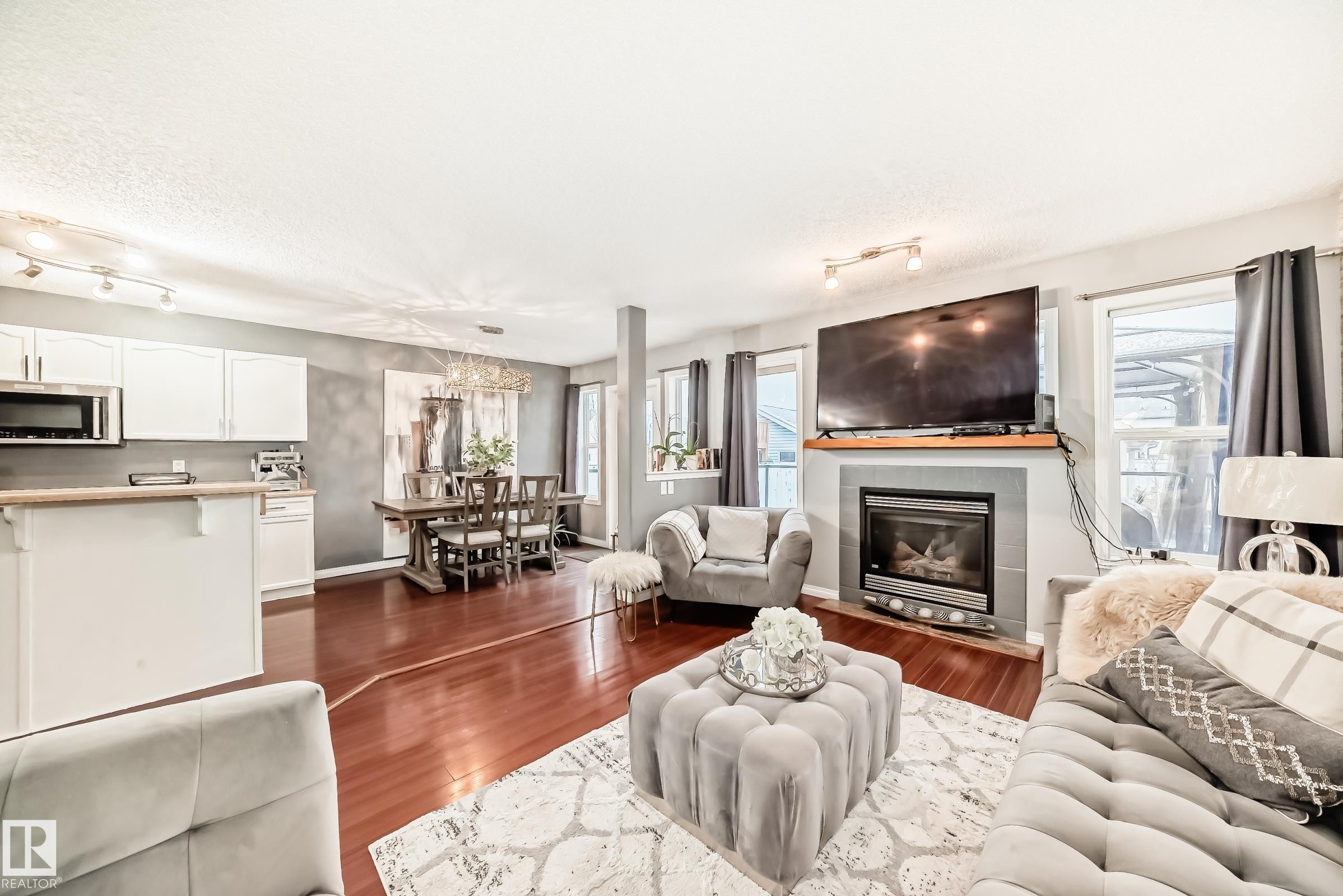 5819 Sutter Place, Edmonton, AB - Indoor Photo Showing Living Room With Fireplace