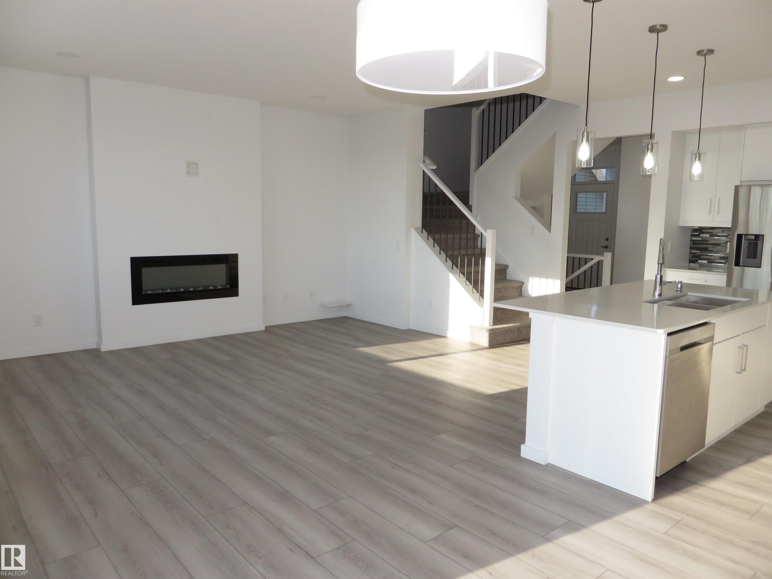 23 Sturtz Place, Leduc, AB - Indoor With Fireplace