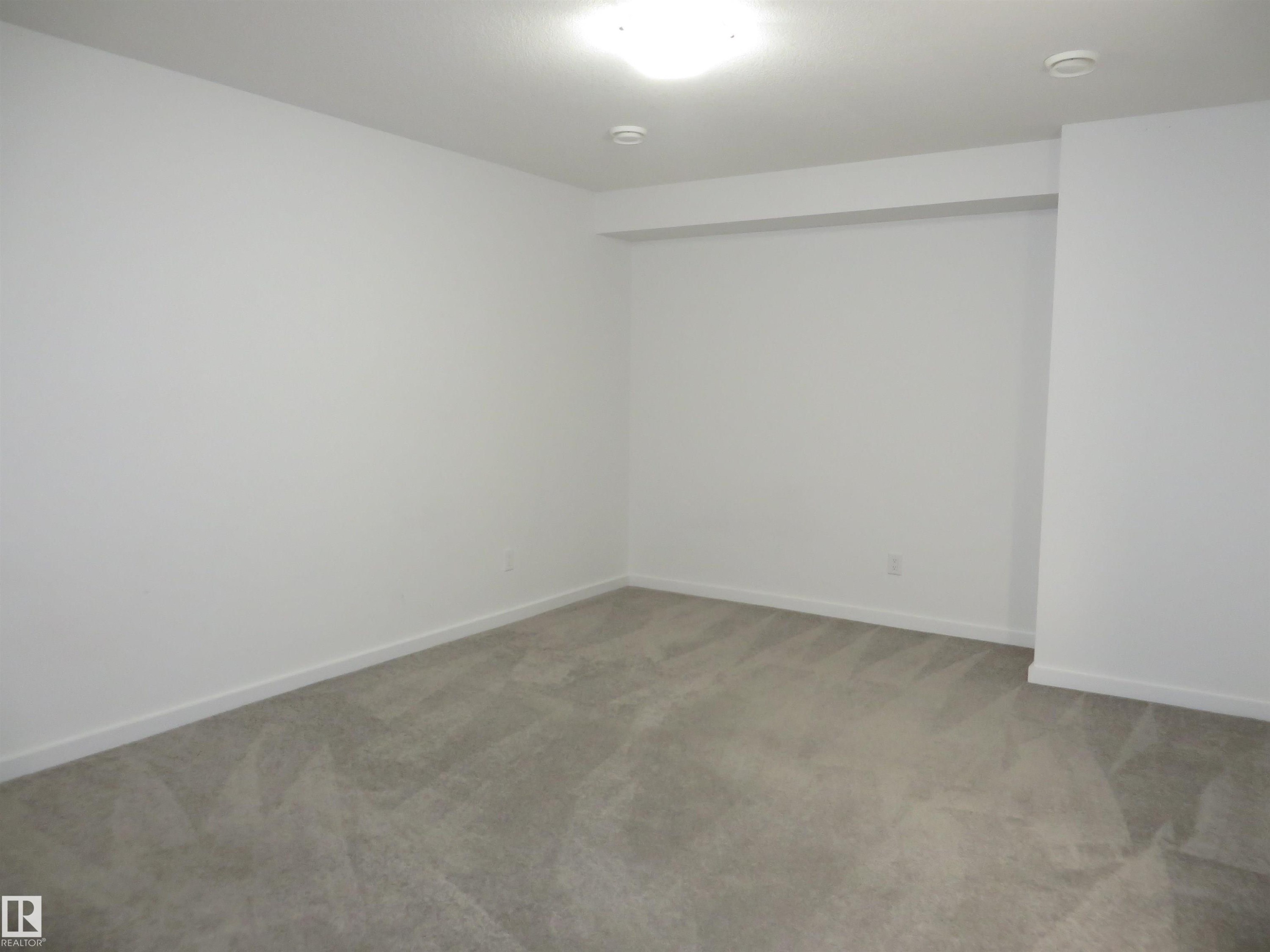 23 Sturtz Place, Leduc, AB - Indoor Photo Showing Other Room