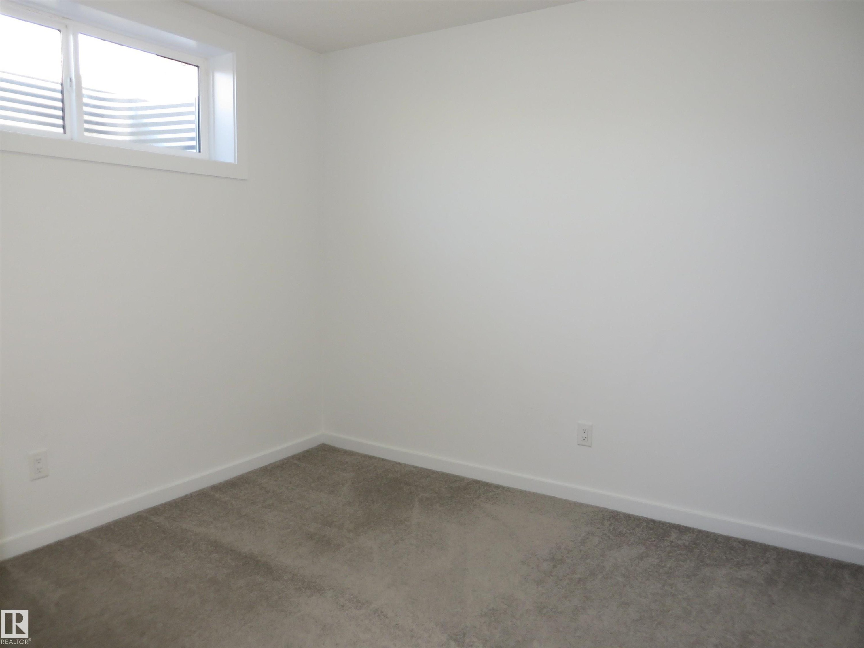 23 Sturtz Place, Leduc, AB - Indoor Photo Showing Other Room