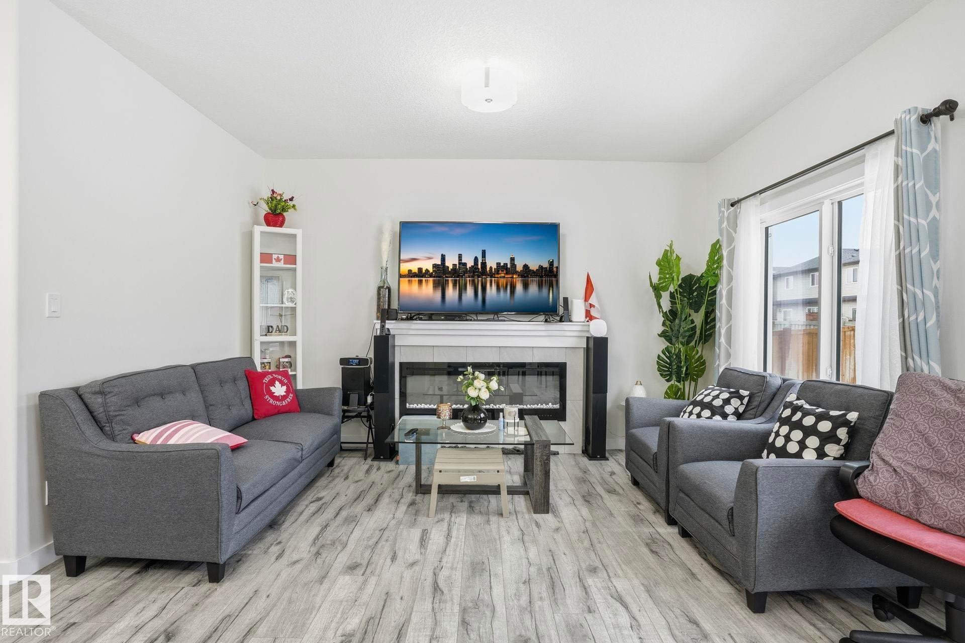 7212 Chivers Place, Edmonton, AB - Indoor Photo Showing Living Room With Fireplace