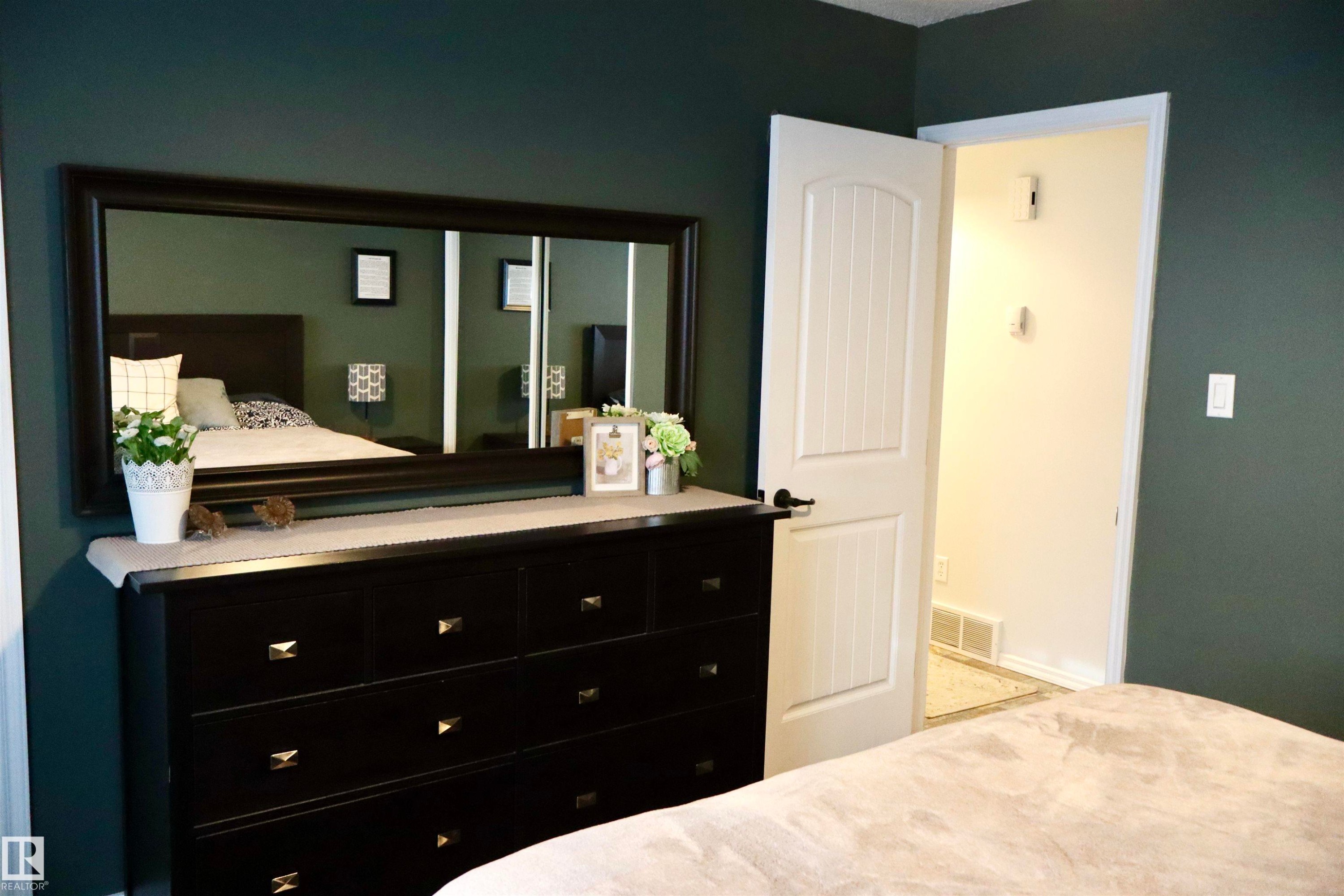 View of bedroom - 4505 58 Avenue, Barrhead, AB - Indoor Photo Showing Bedroom
