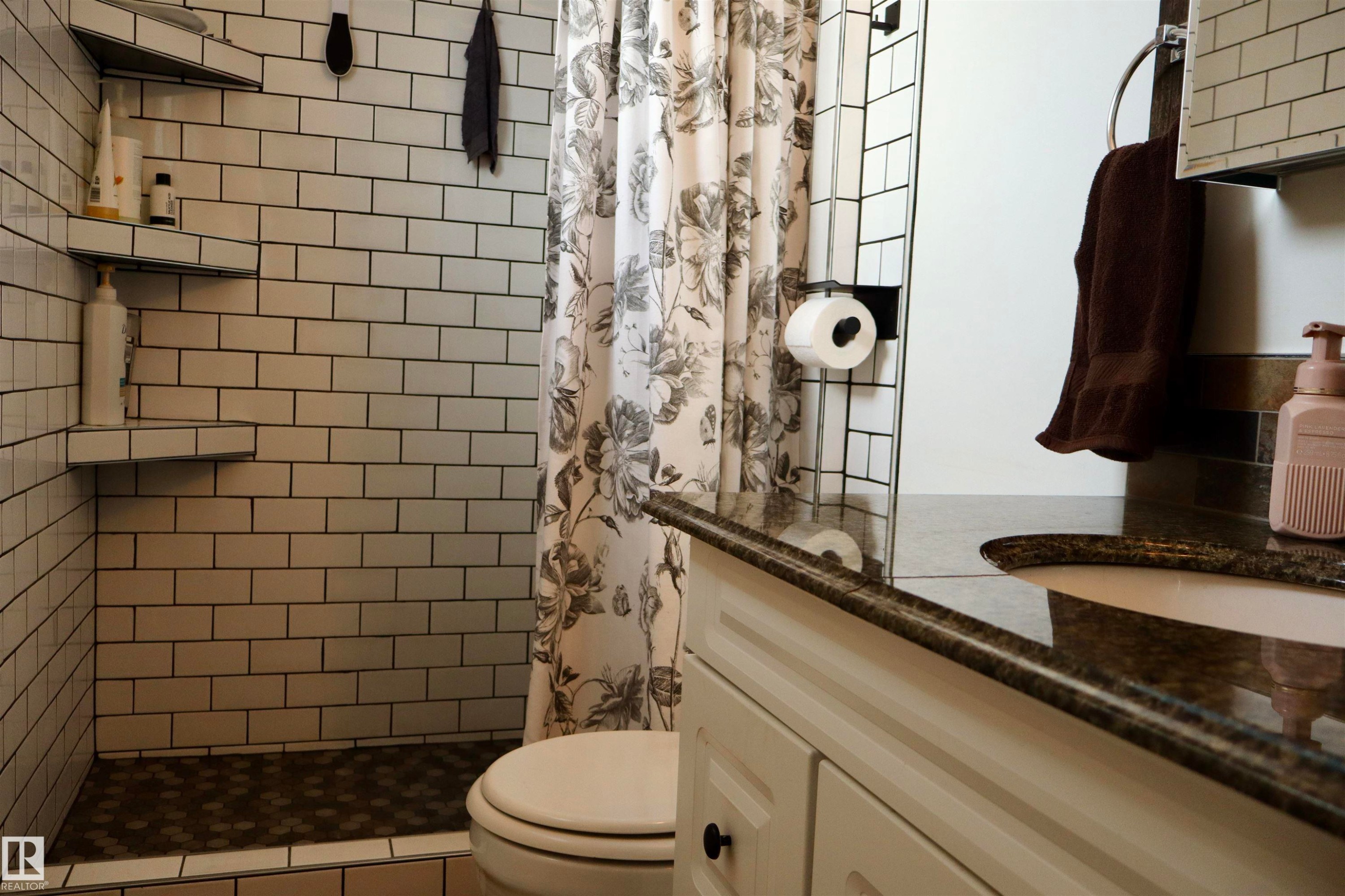 Bathroom with vanity and a stall shower - 4505 58 Avenue, Barrhead, AB - Indoor Photo Showing Bathroom