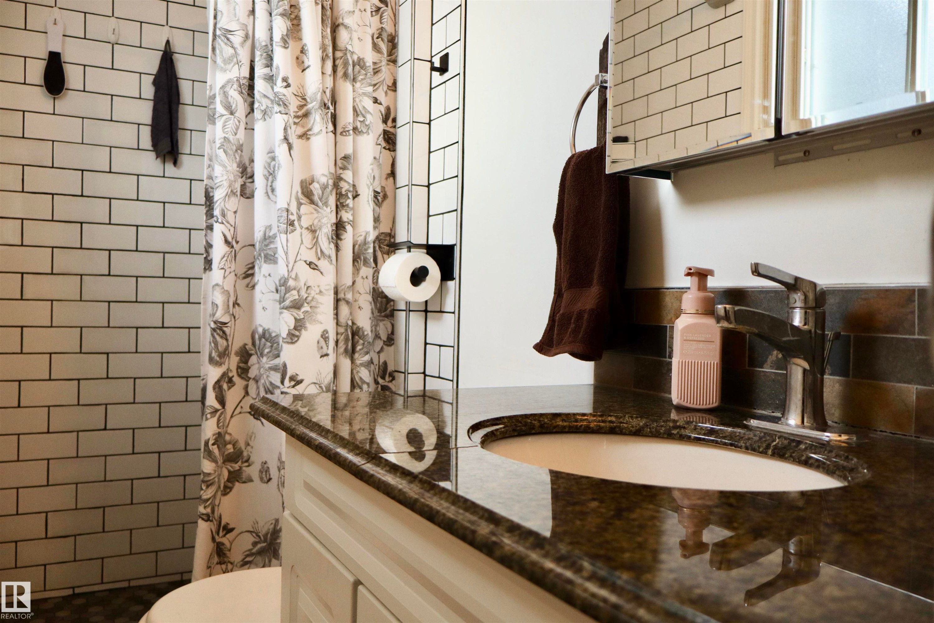 Bathroom with vanity and a tile shower - 4505 58 Avenue, Barrhead, AB - Indoor Photo Showing Bathroom