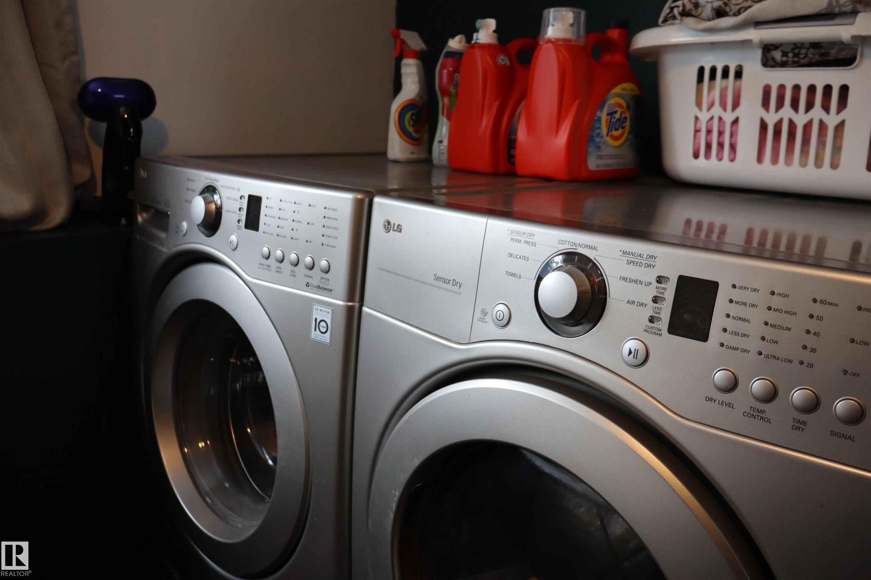 Laundry room with independent washer and dryer - 4505 58 Avenue, Barrhead, AB - Indoor Photo Showing Laundry Room