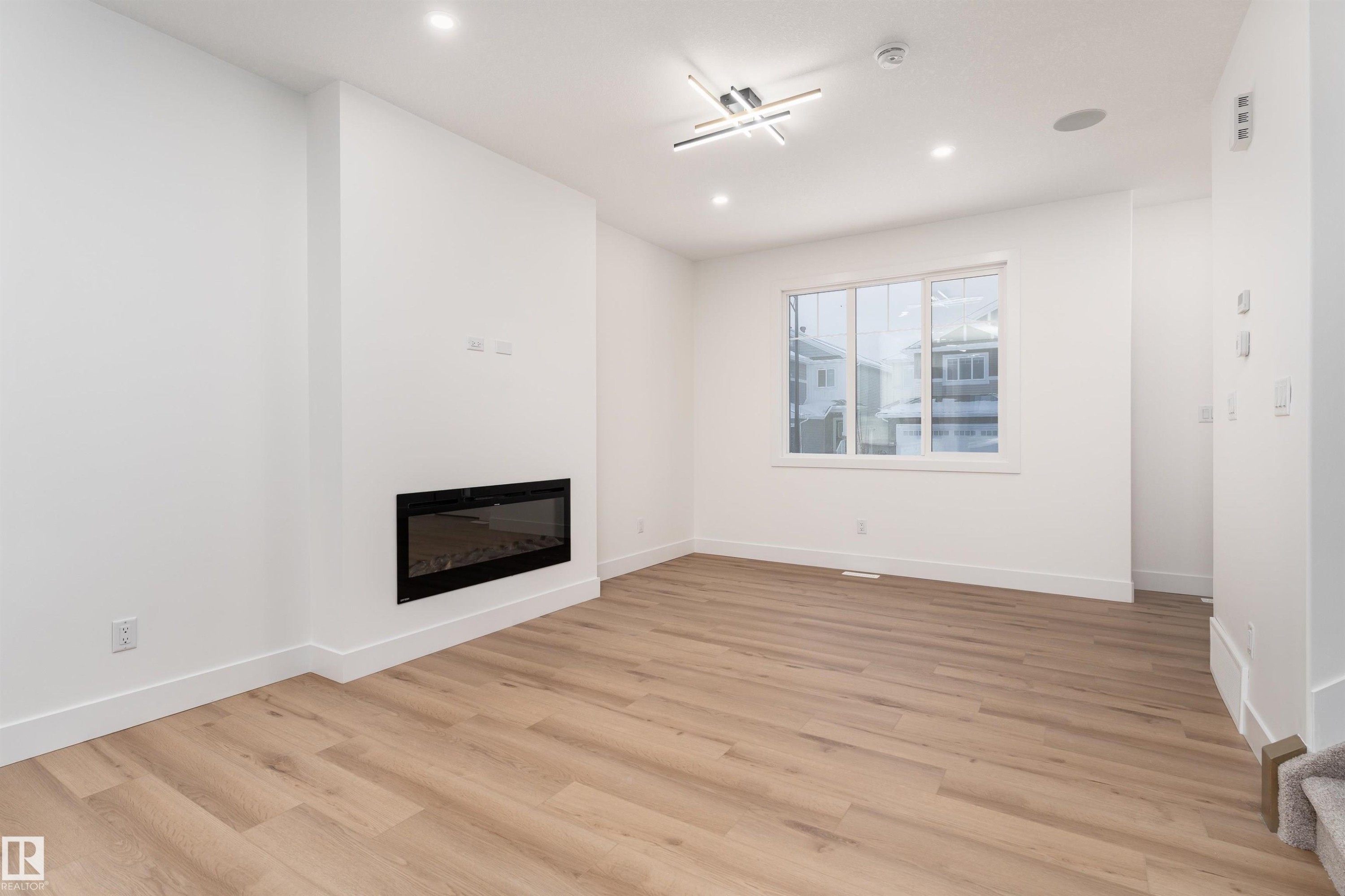 3109 Magpie Way, Edmonton, AB - Indoor With Fireplace
