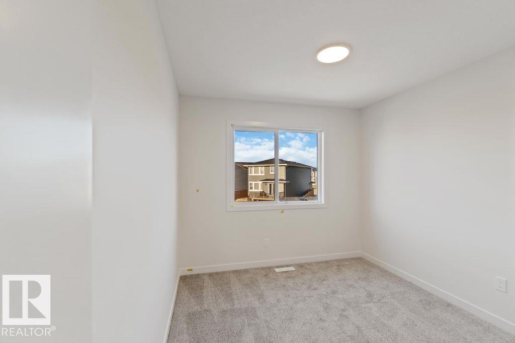 150 Garneau Gate, Spruce Grove, AB - Indoor Photo Showing Other Room