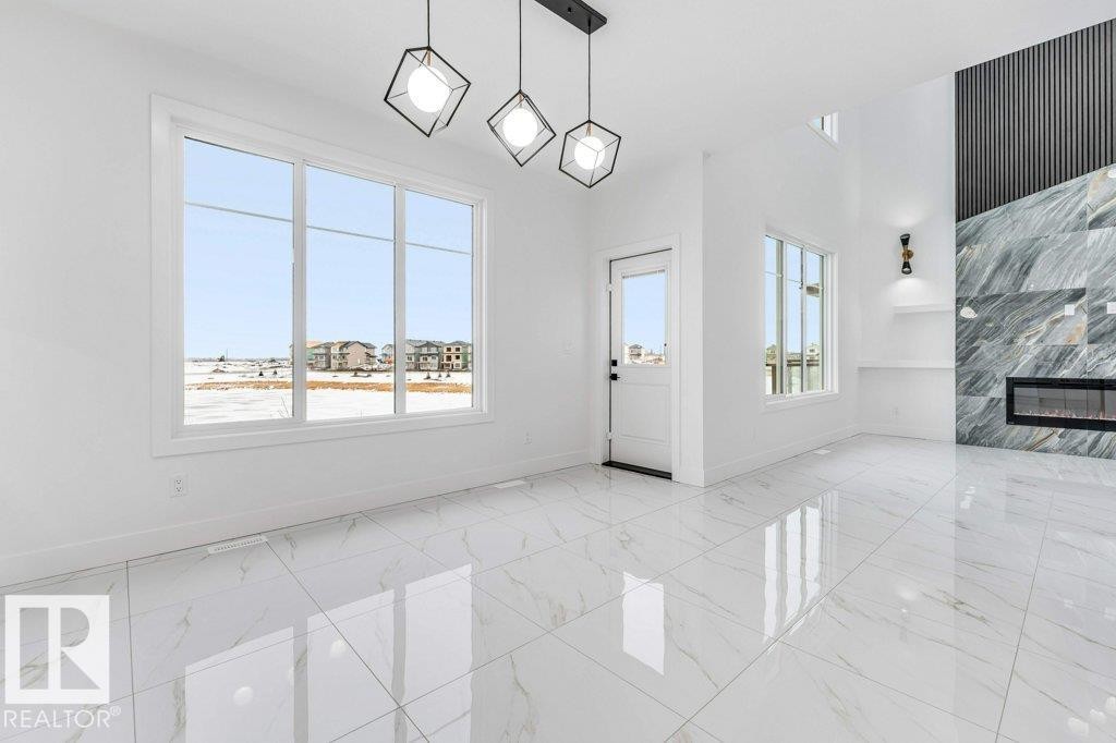 221 Crystal Creek Drive, Leduc, AB - Indoor Photo Showing Other Room With Fireplace