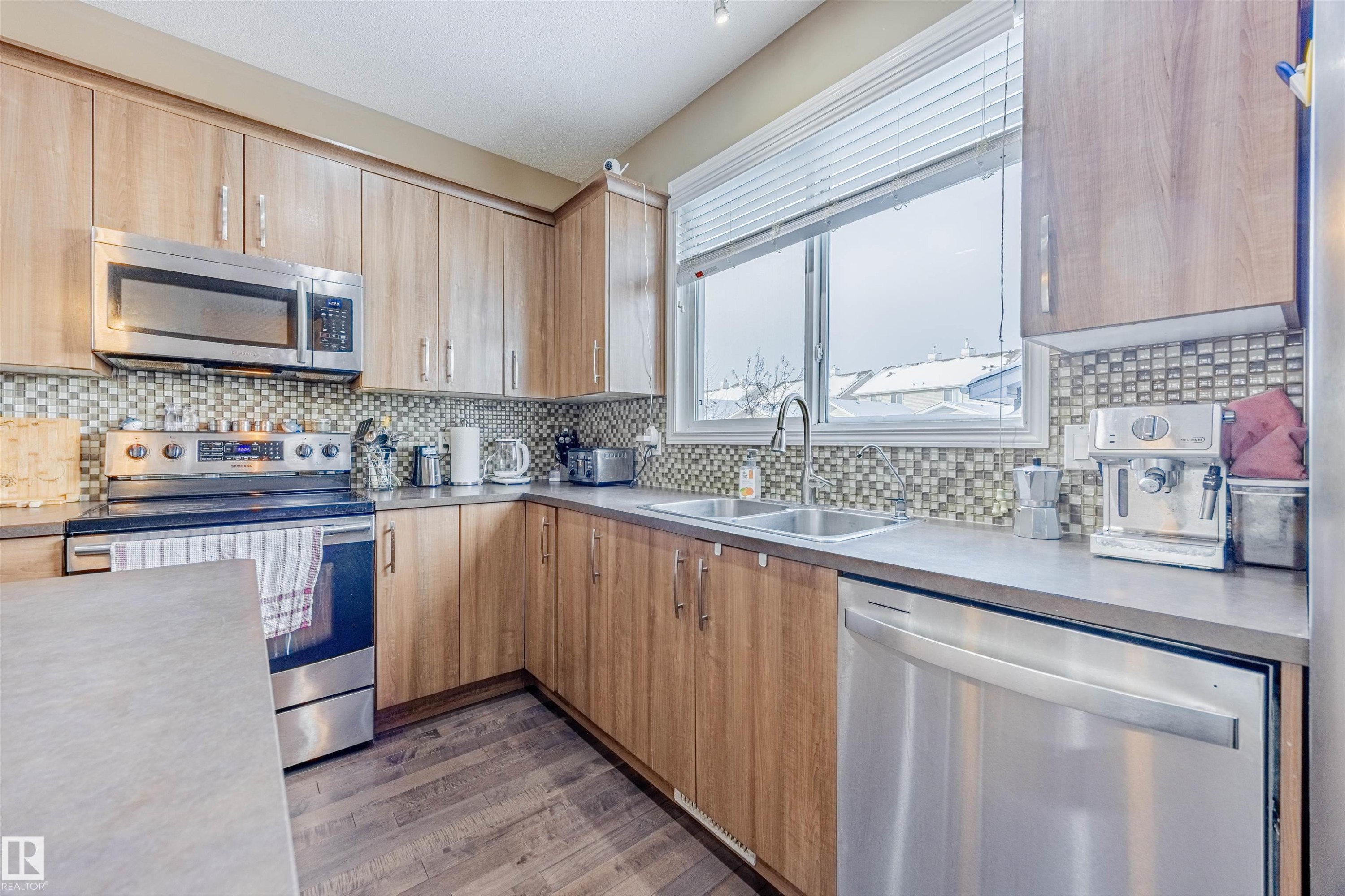 1312 74 Street, Edmonton, AB - Indoor Photo Showing Kitchen With Stainless Steel Kitchen With Double Sink