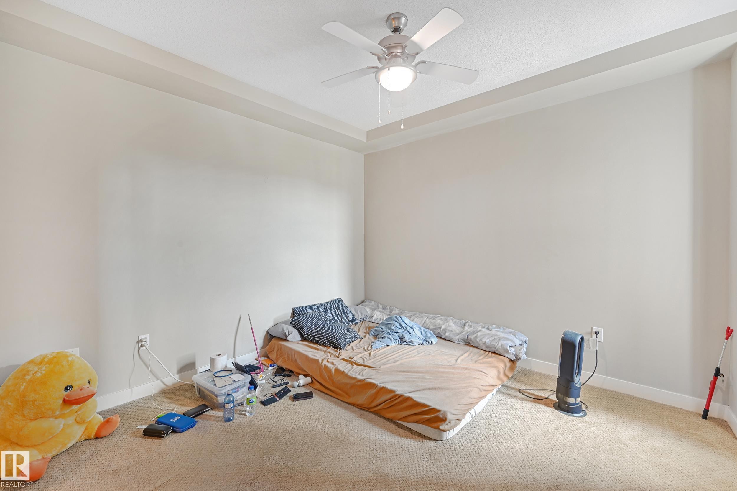 313 1230 Windermere Way, Edmonton, AB - Indoor Photo Showing Bedroom