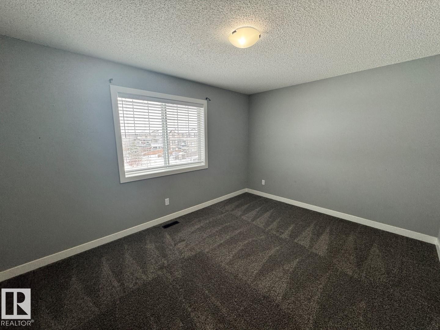 1352 Secord Landing Landing, Edmonton, AB - Indoor Photo Showing Other Room