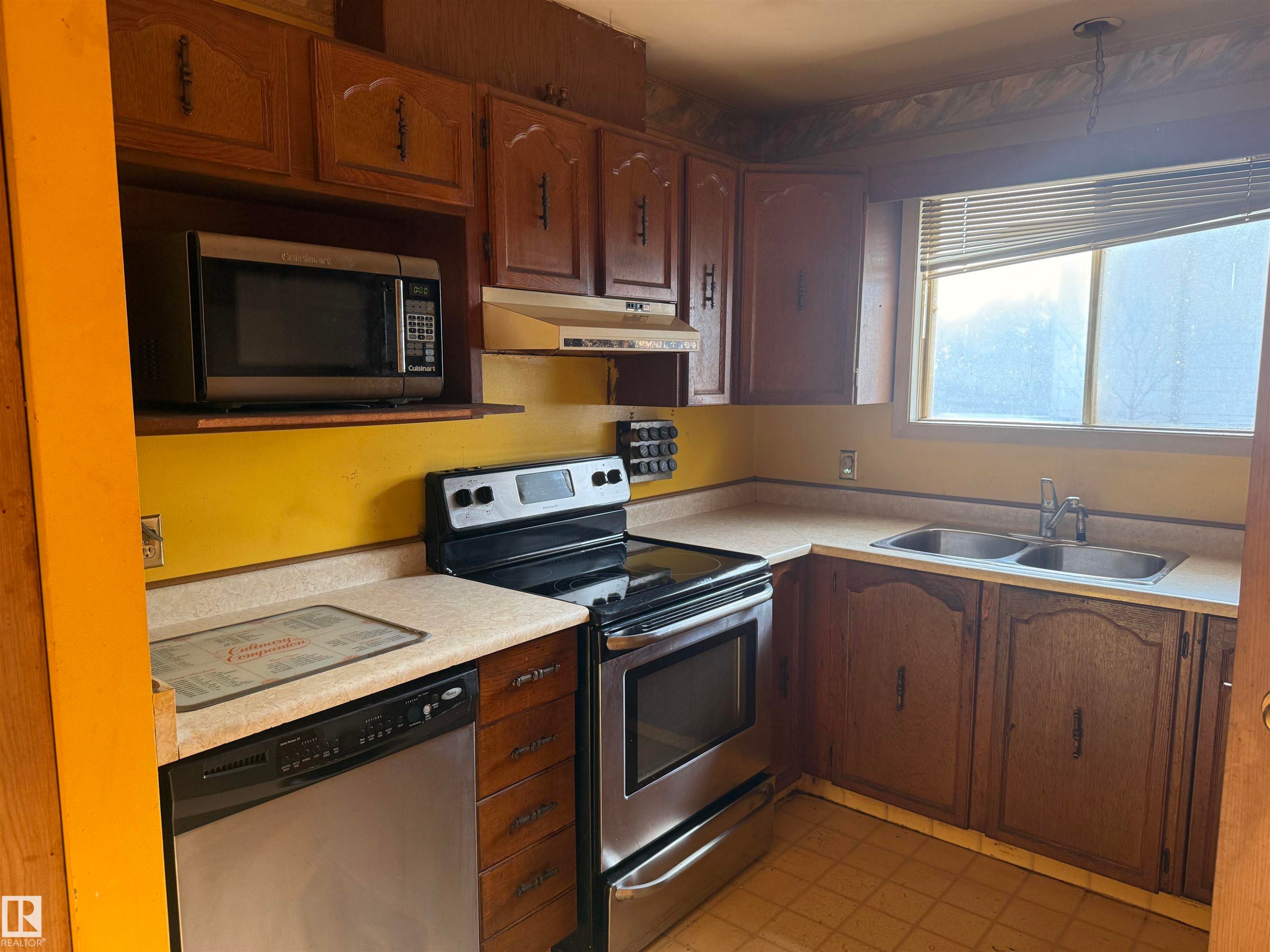 Edmonton, AB - Indoor Photo Showing Kitchen With Double Sink