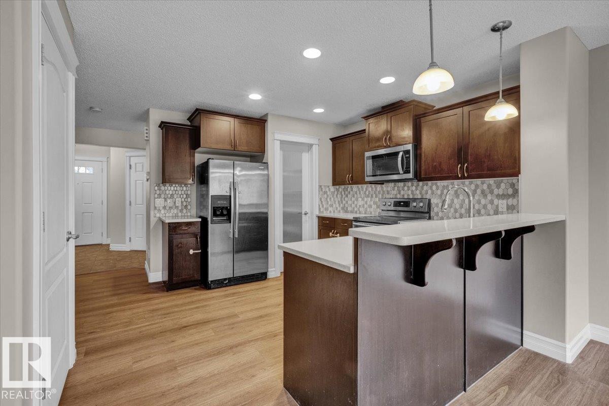 Edmonton, AB - Indoor Photo Showing Kitchen