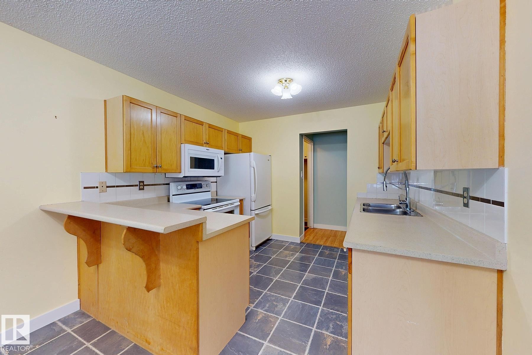 131 Garland Crescent, Sherwood Park, AB - Indoor Photo Showing Kitchen With Double Sink