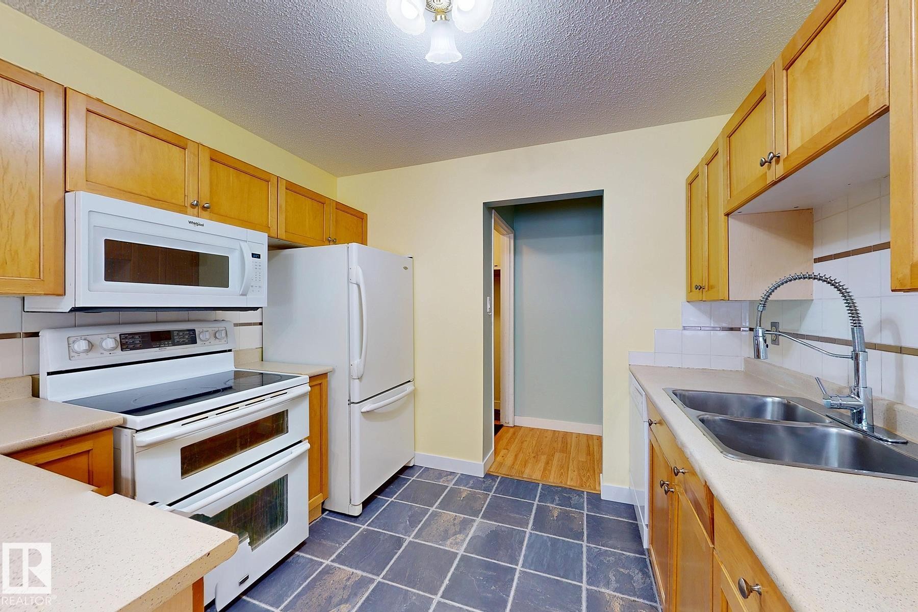 131 Garland Crescent, Sherwood Park, AB - Indoor Photo Showing Kitchen With Double Sink