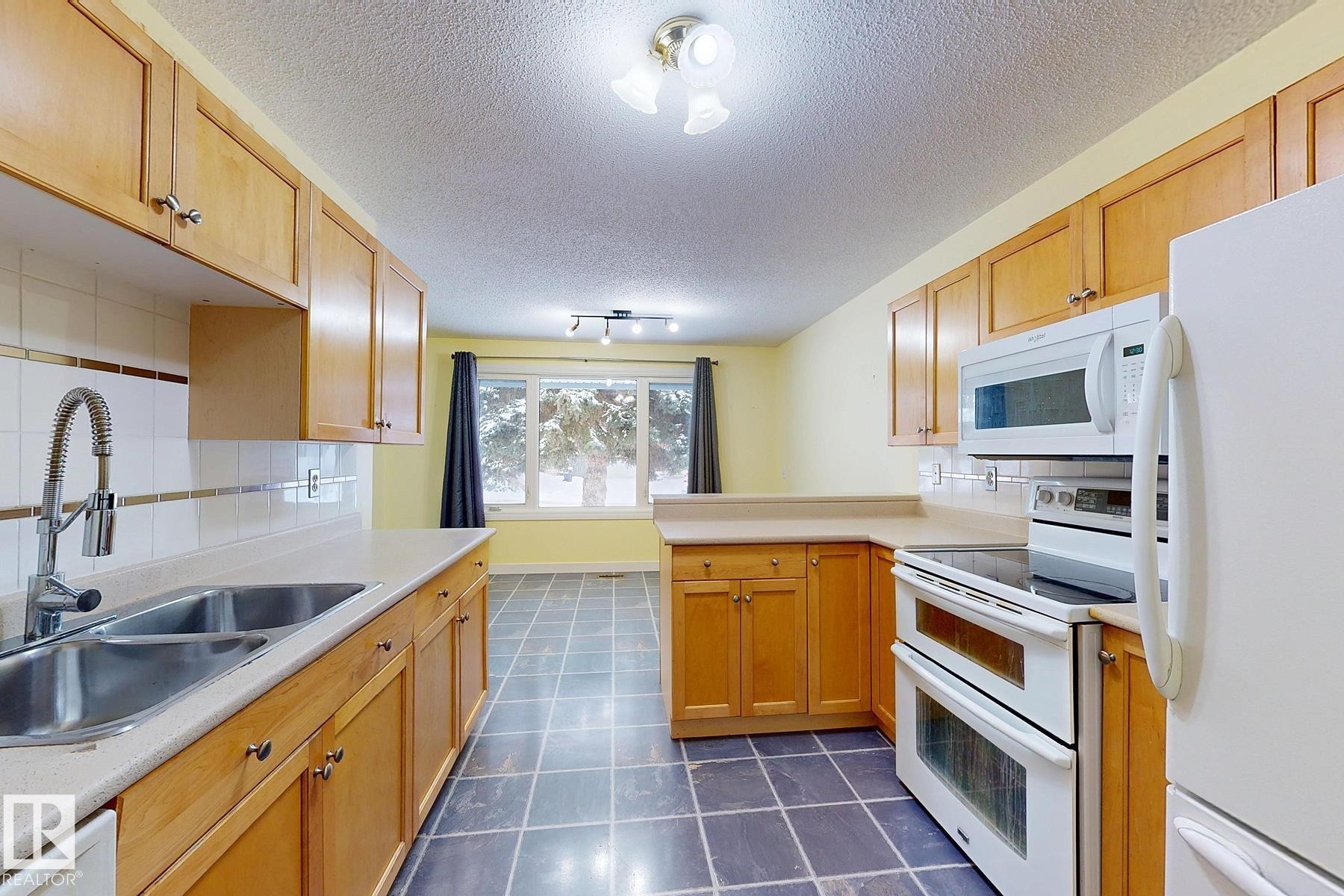 131 Garland Crescent, Sherwood Park, AB - Indoor Photo Showing Kitchen With Double Sink