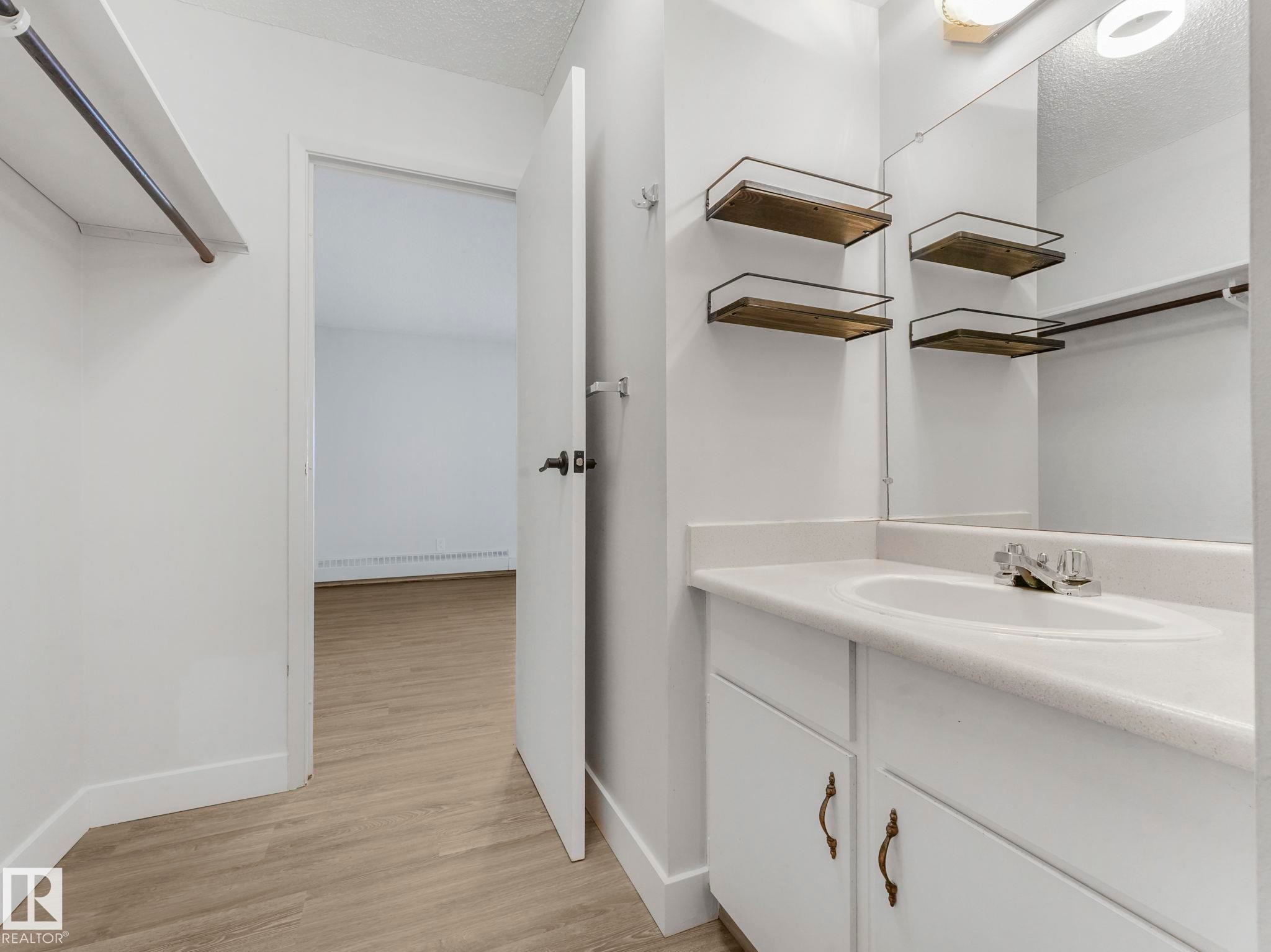 lots of extra storage - 406 10125 109 Street, Edmonton, AB - Indoor Photo Showing Bathroom