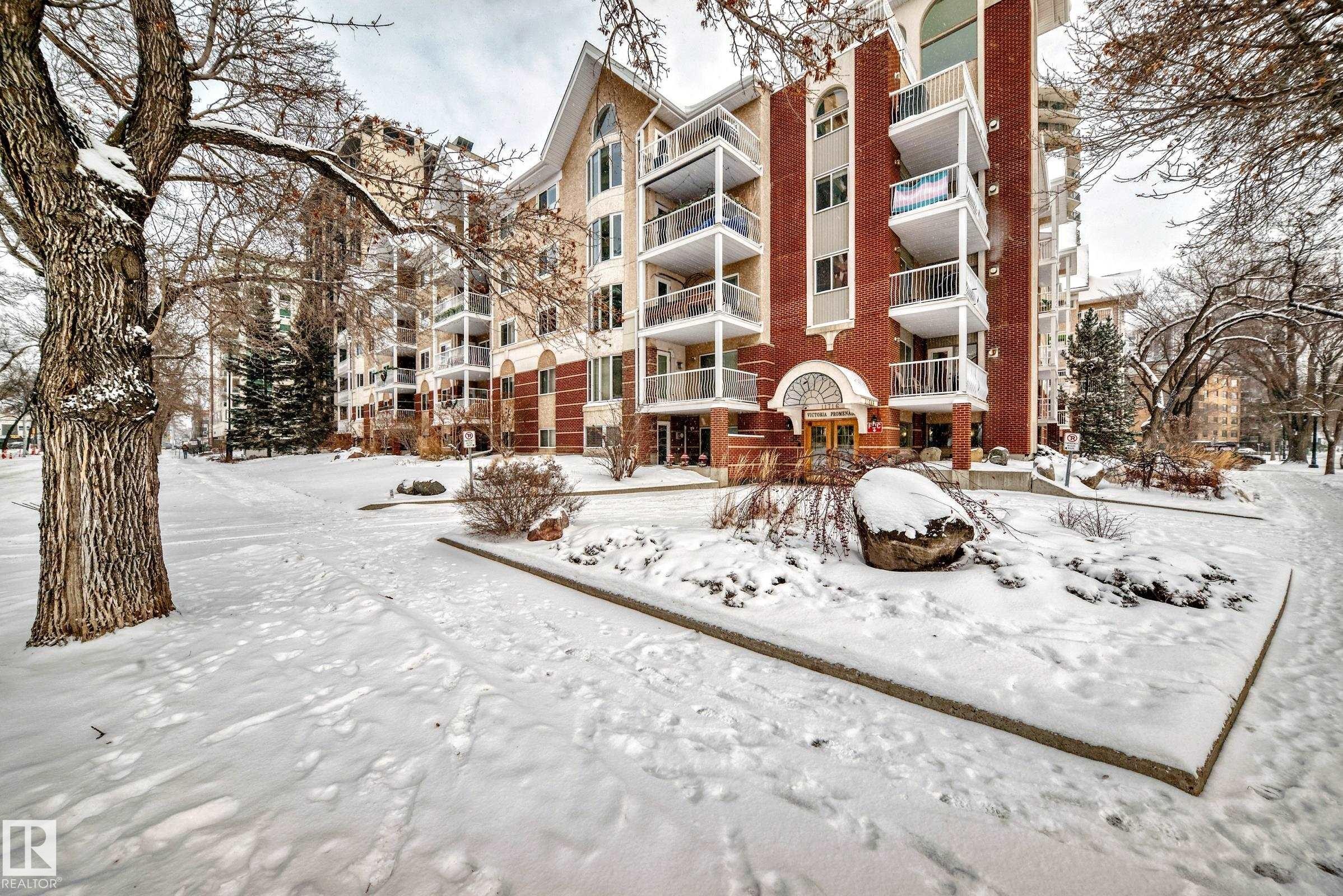 Snow covered building with a view of apartment building / complex - 507 11716 100 Avenue, Edmonton, AB - Outdoor With Balcony With Facade