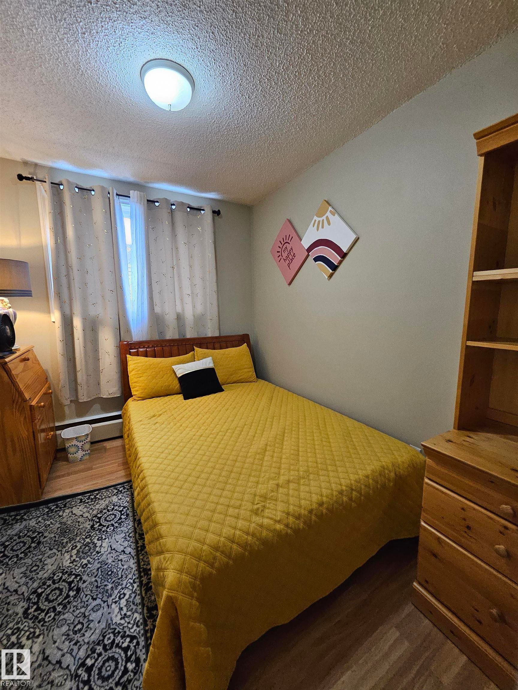 102 12223 82 Street, Edmonton, AB - Indoor Photo Showing Bedroom