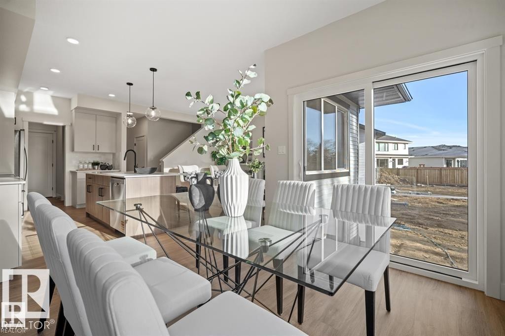 Dining area with light wood finished floors and recessed lighting - 24 Grayson Green, Stony Plain, AB - Indoor