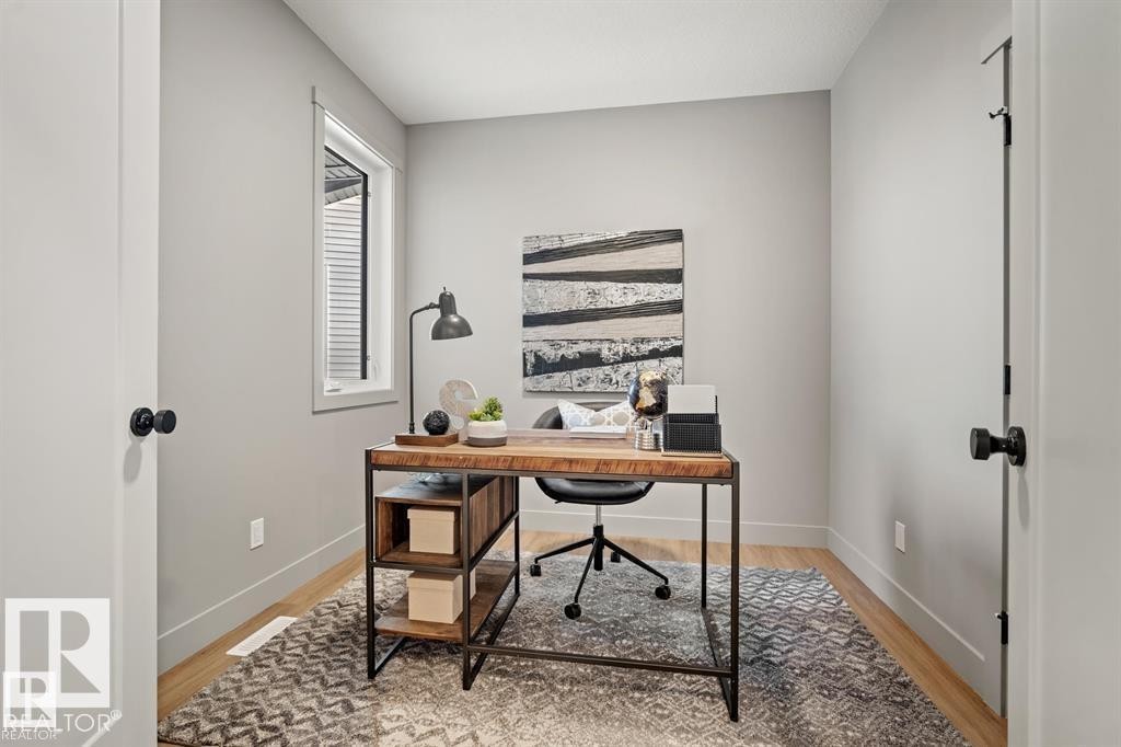 Home office featuring light wood-style floors and baseboards - 24 Grayson Green, Stony Plain, AB - Indoor Photo Showing Office