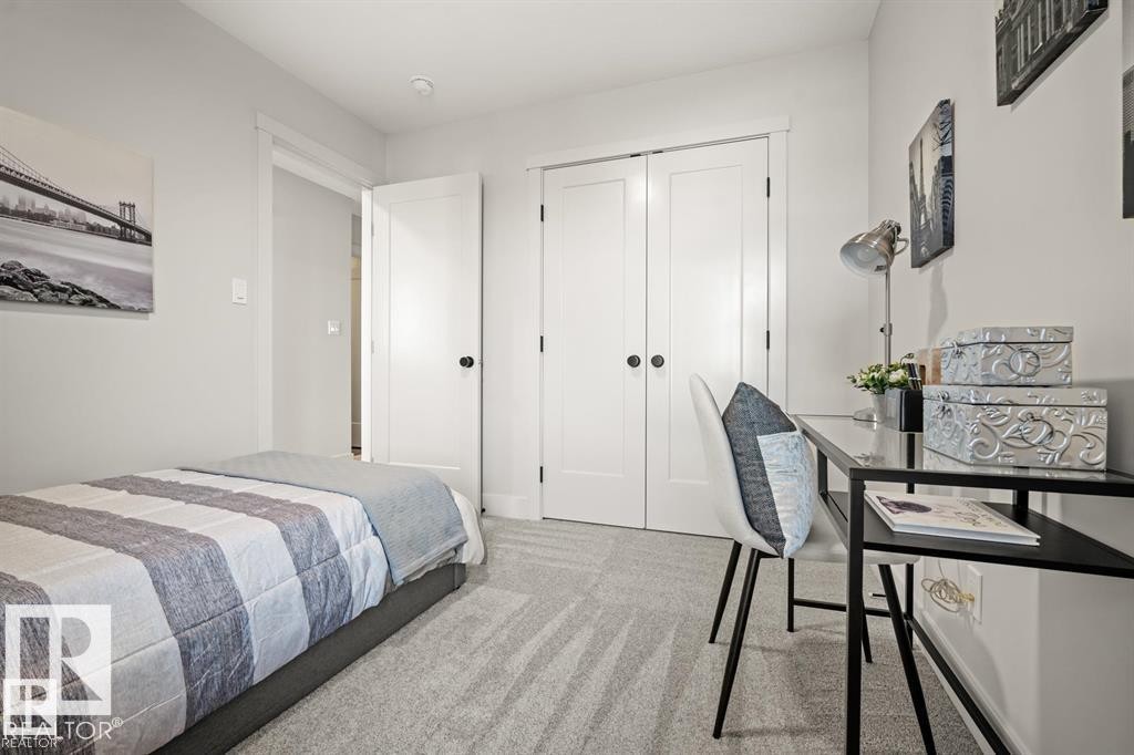 Bedroom with carpet flooring and a closet - 24 Grayson Green, Stony Plain, AB - Indoor Photo Showing Bedroom