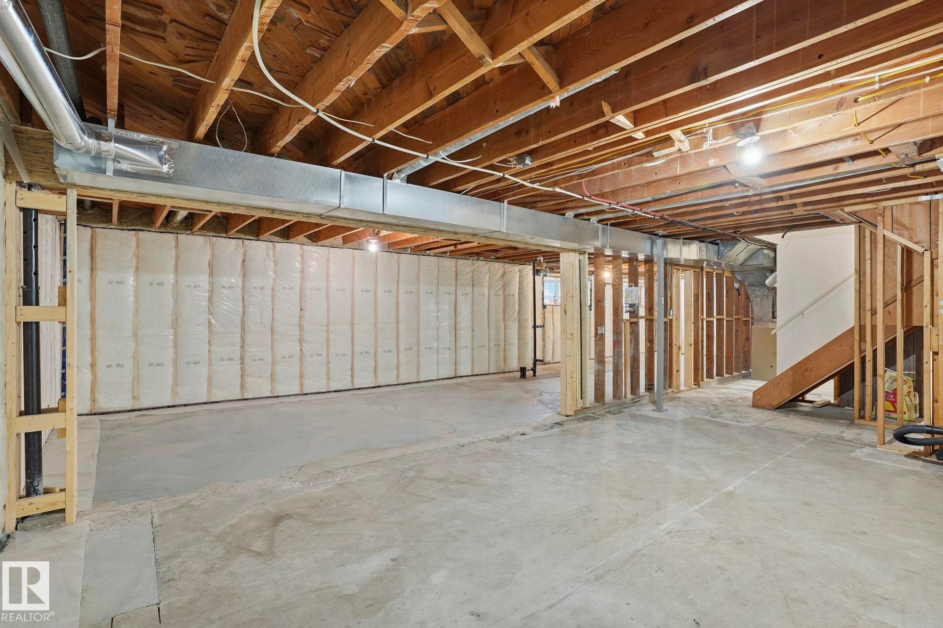 View of unfinished below grade area - 14604 Mackenzie Drive, Edmonton, AB - Indoor Photo Showing Basement