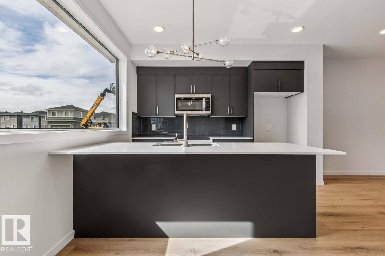 8128 228 Street Nw, Edmonton, AB - Indoor Photo Showing Kitchen