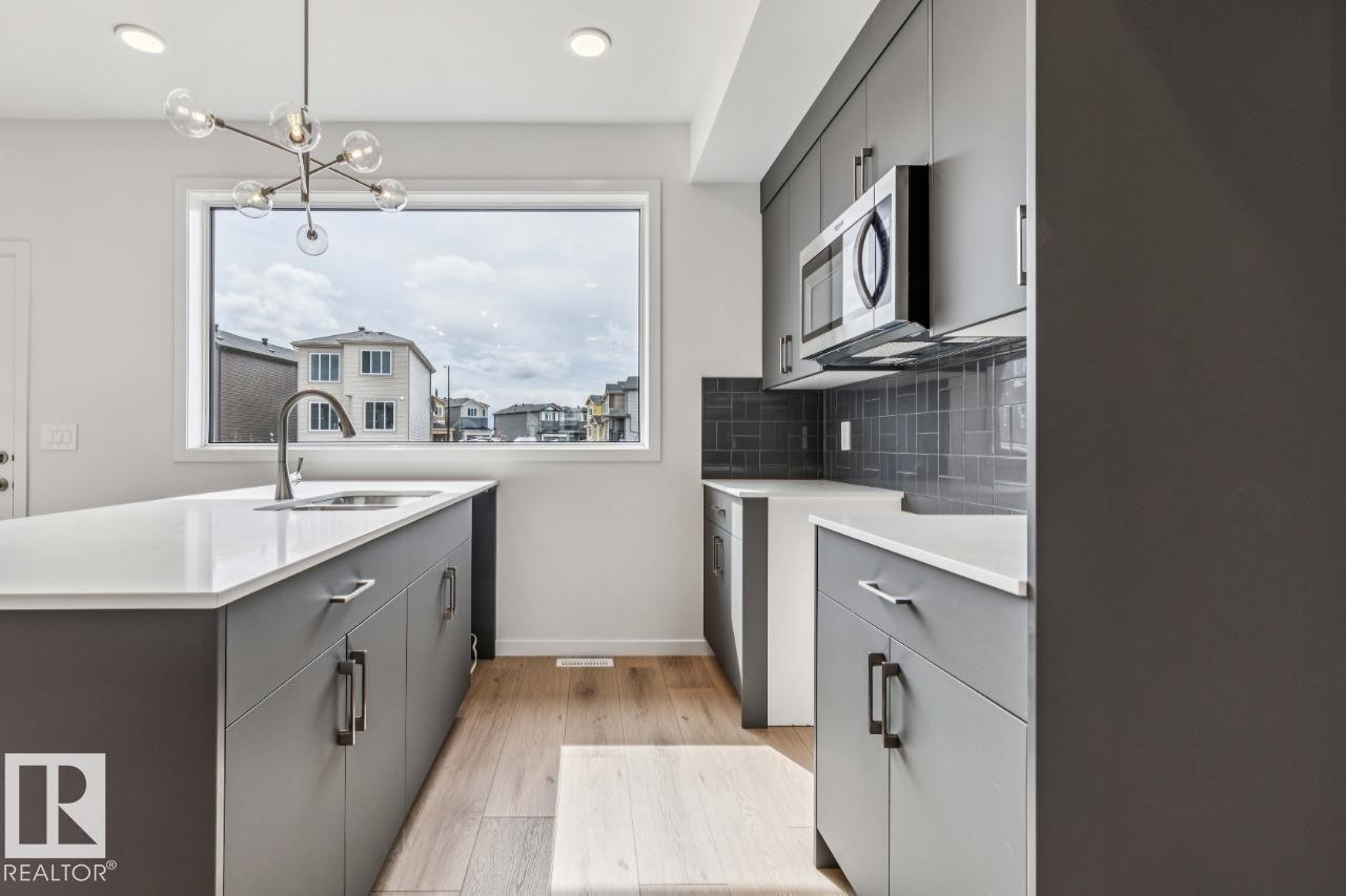 8128 228 Street Nw, Edmonton, AB - Indoor Photo Showing Kitchen