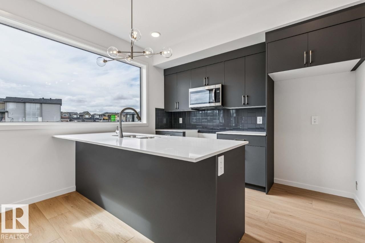 8128 228 Street Nw, Edmonton, AB - Indoor Photo Showing Kitchen