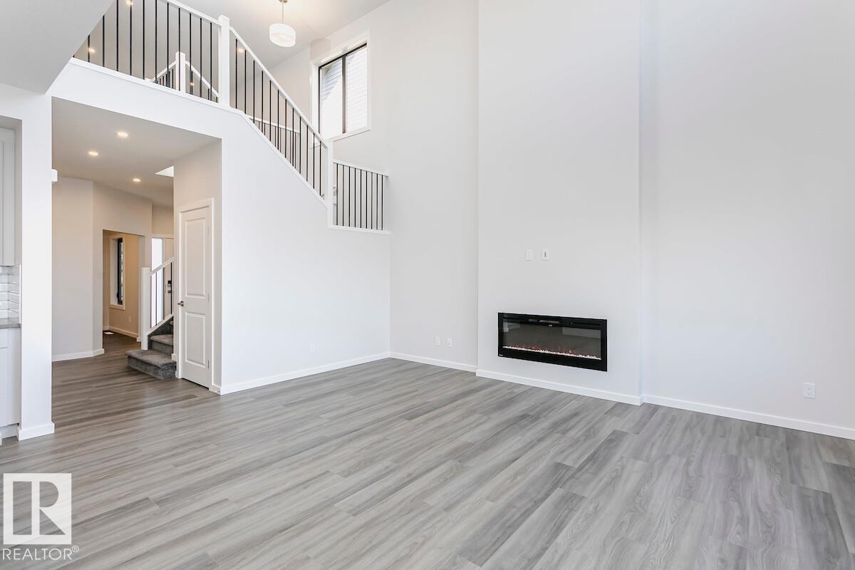 8 Cloutier Close, St. Albert, AB - Indoor With Fireplace