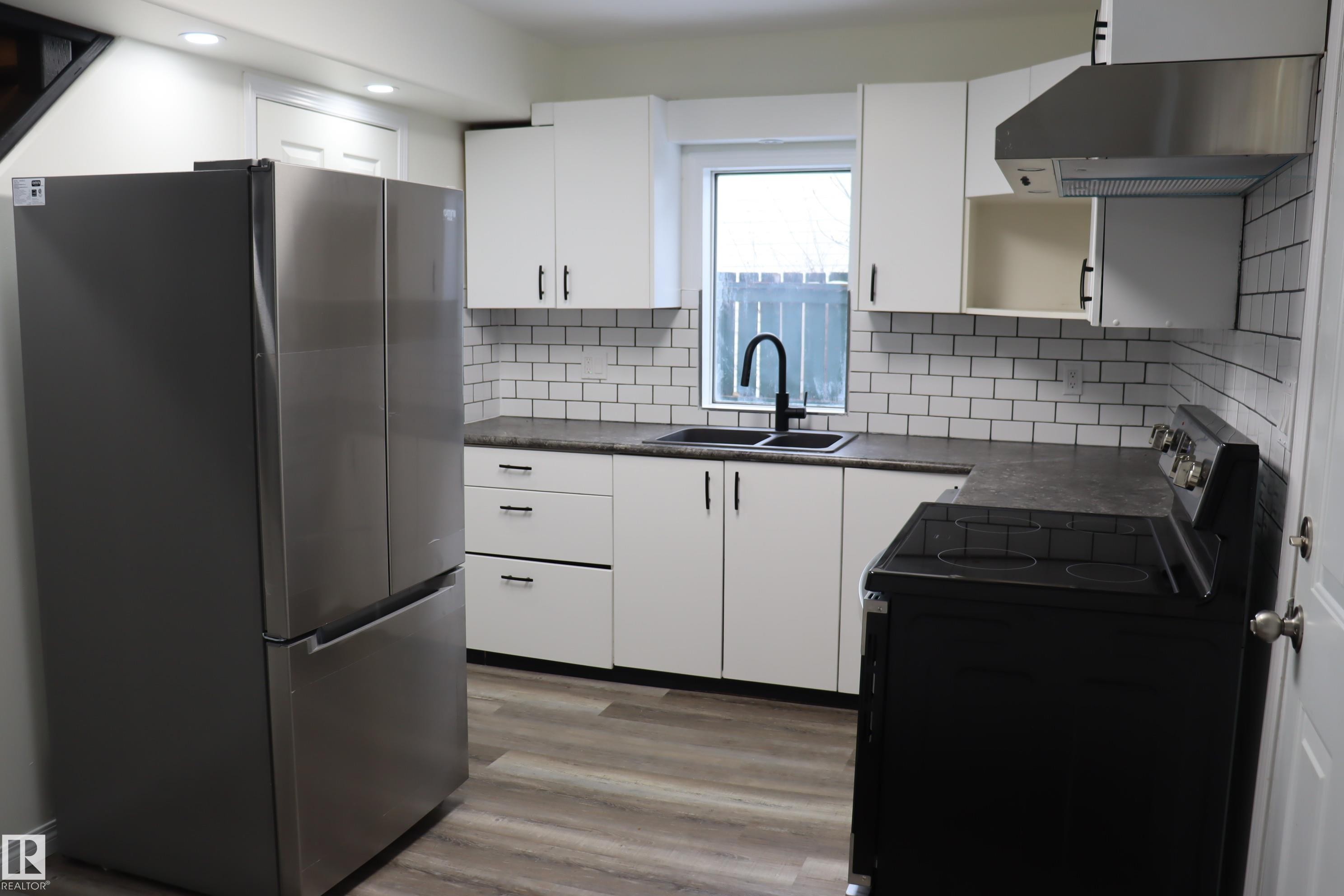All new appliances - 4508 52 St., Wetaskiwin, AB - Indoor Photo Showing Kitchen With Double Sink